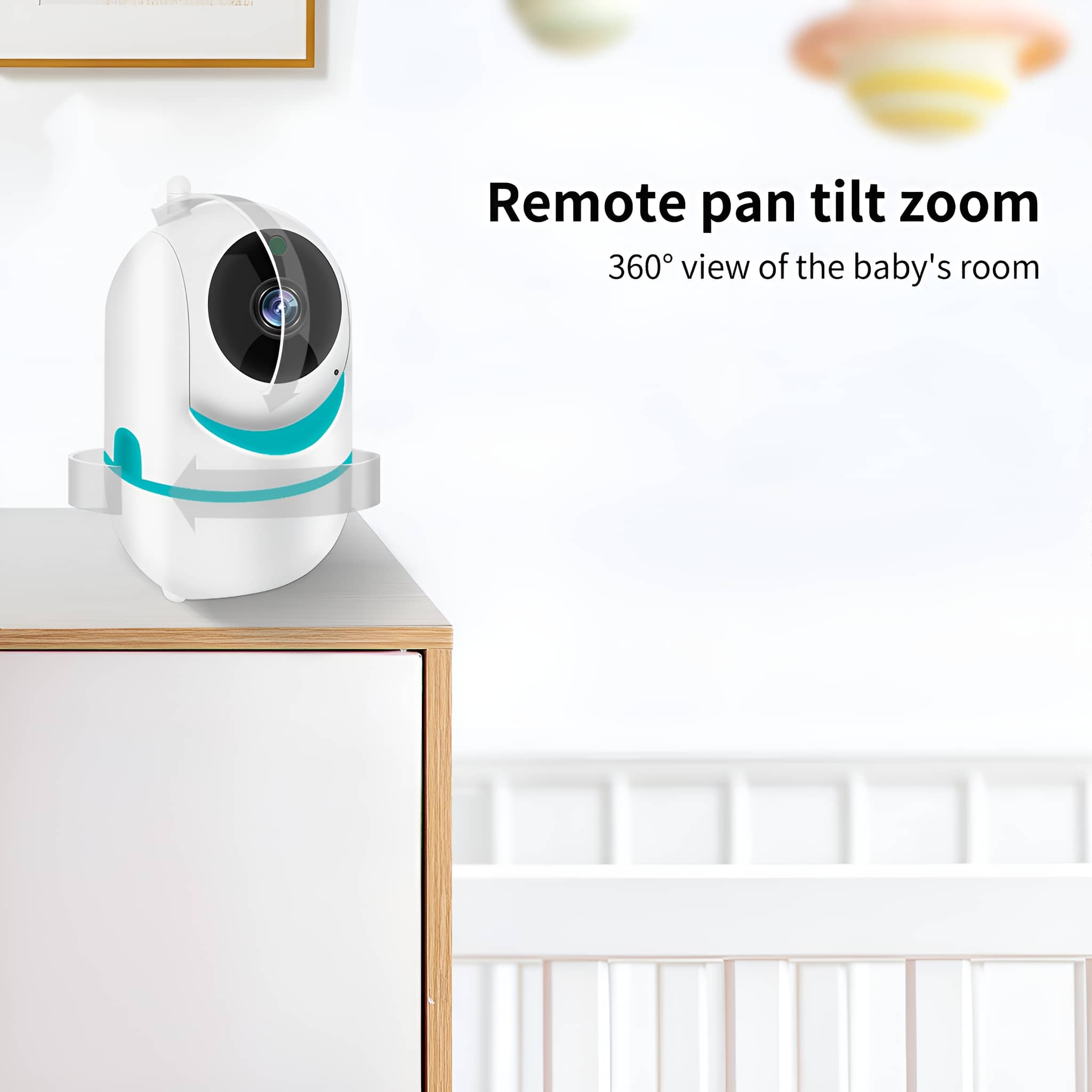Weißer Babyphone auf einer Kommode. Eine 360°-Ansicht wird gezeigt. Der Hintergrund zeigt ein Babybett.