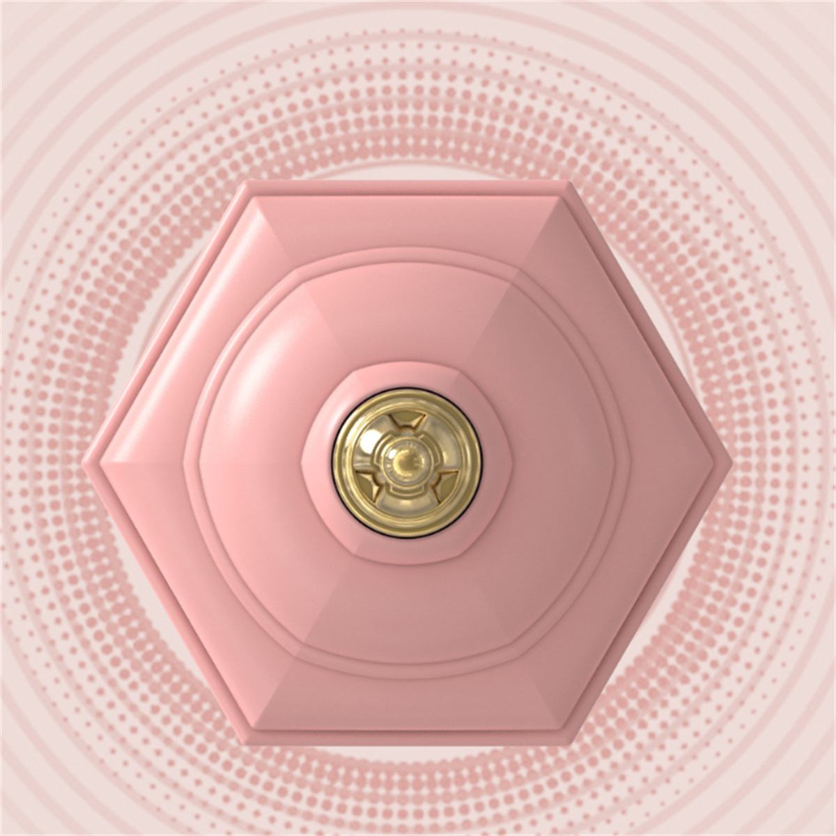 Ein rosa sechseckiges Objekt mit einem goldenen Mittelpunkt auf rosa gepunktetem Hintergrund.