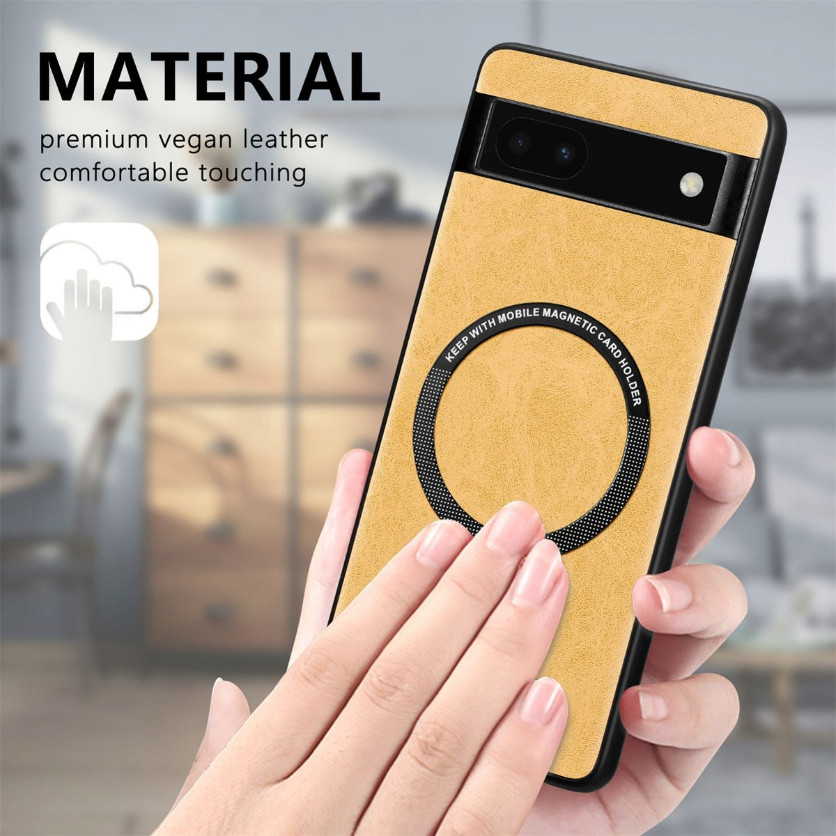 Hand hält gelbe Handyhülle mit Magnetring. Die Hülle liegt auf weißer Oberfläche.