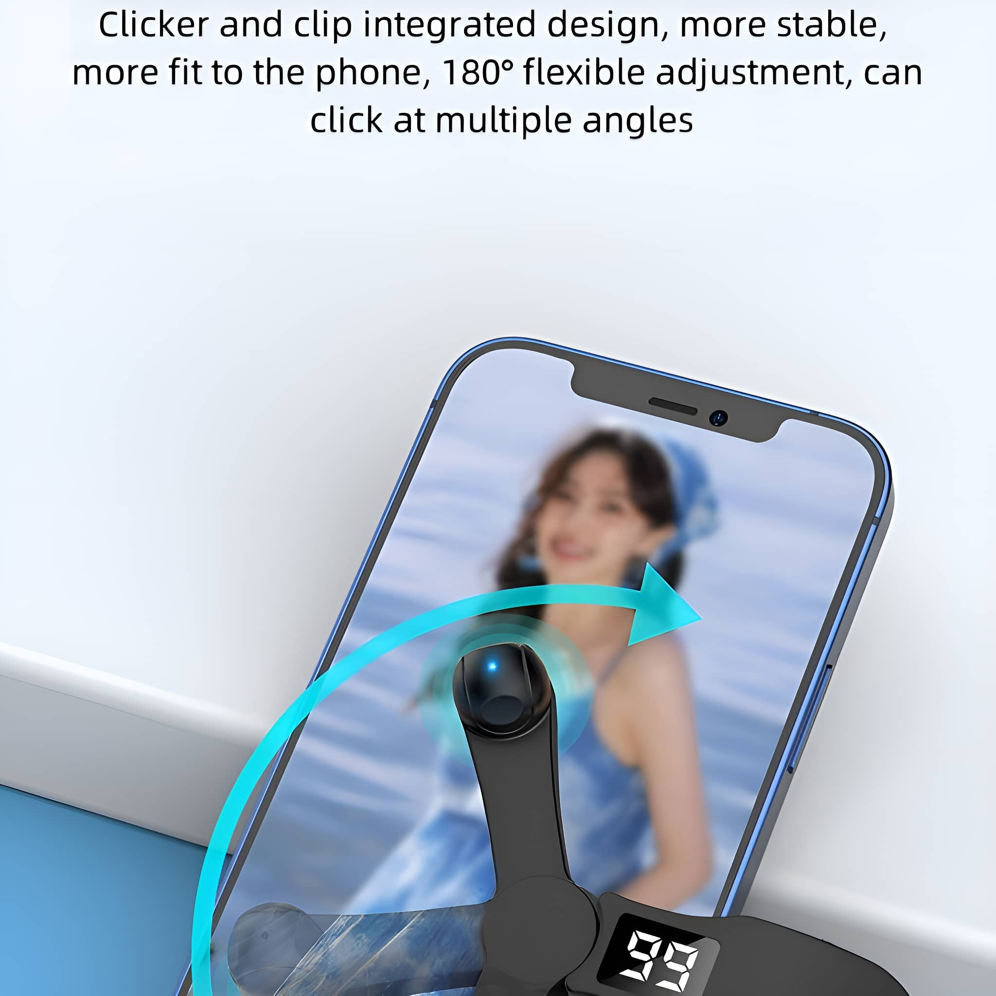 Schwarzes Telefon mit Bild einer Frau. Ein kleiner Ventilator ist am Telefon befestigt.
