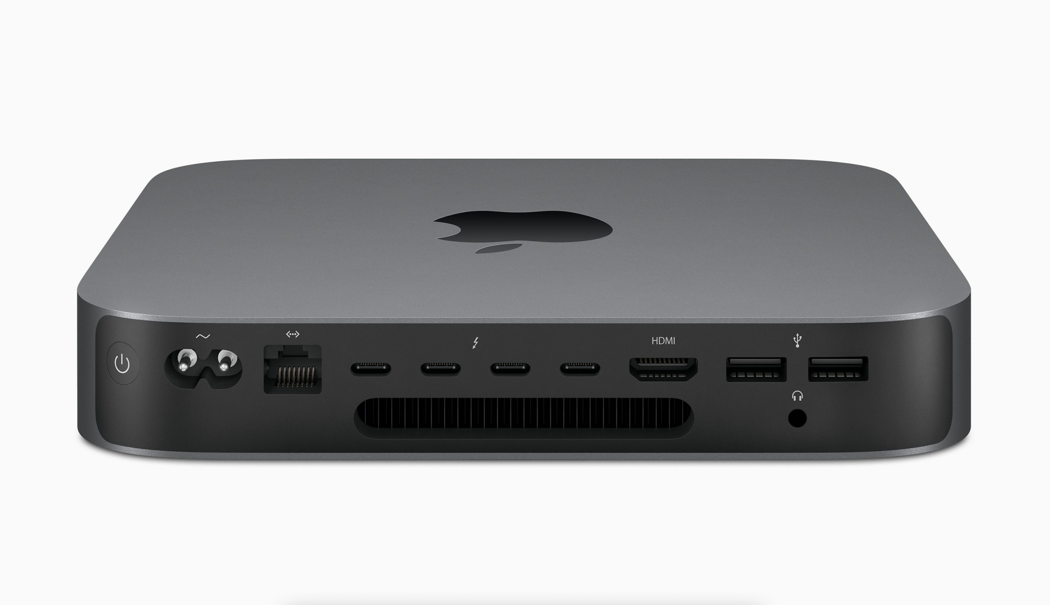 Komputer Mac Mini, ciemnoszary, z portami z tyłu.