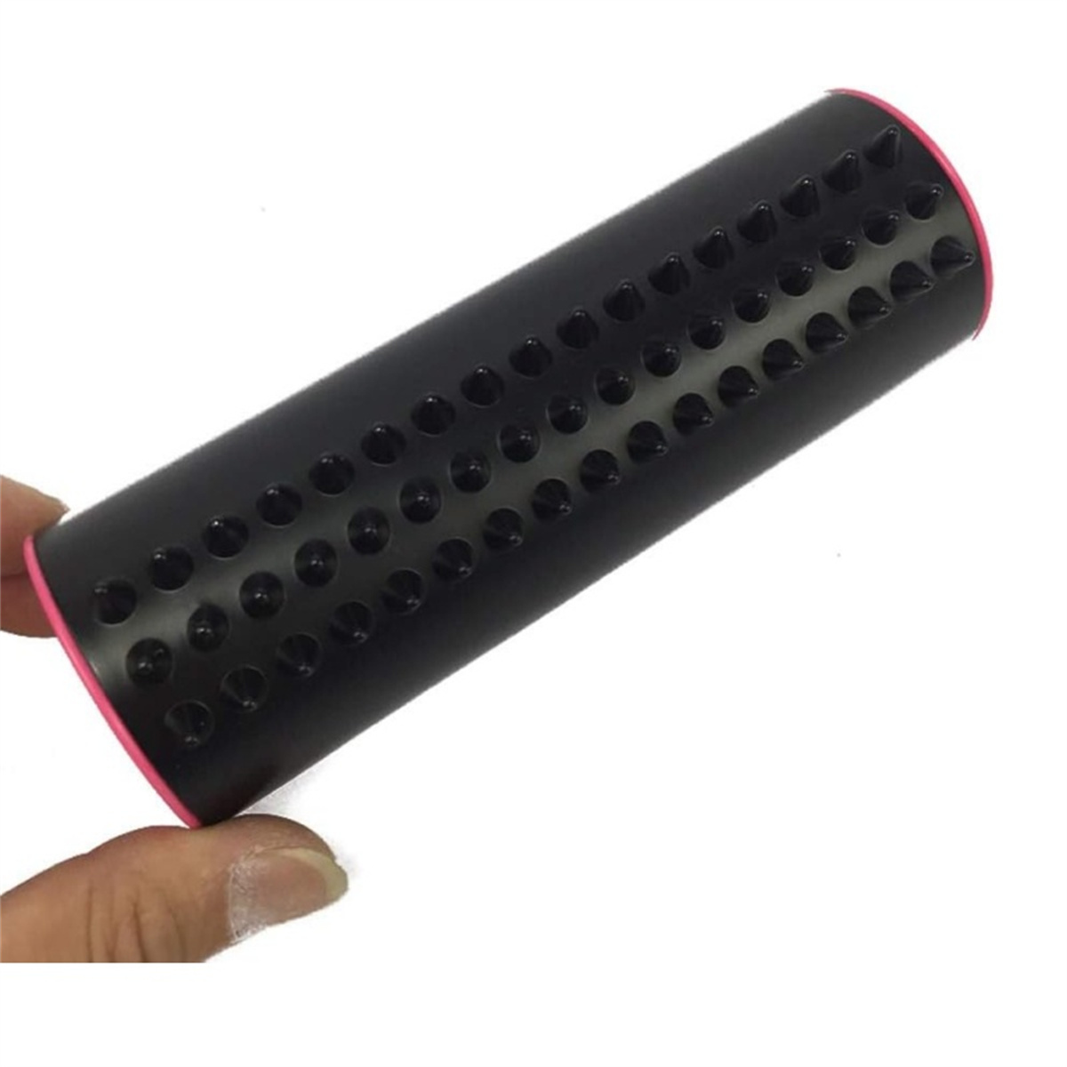 Schwarze Massagerolle mit Stacheln. Pinke Akzente an den Rändern.