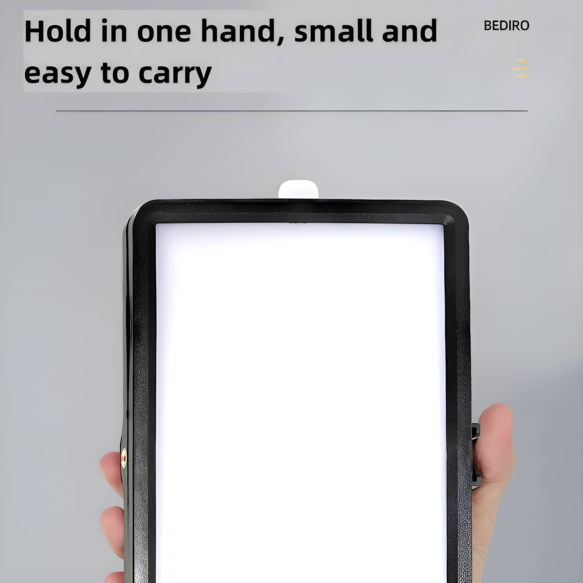 Hand hält ein Leuchtpad mit hellem, weißem Bildschirm. Text: 'Hold in one hand...'