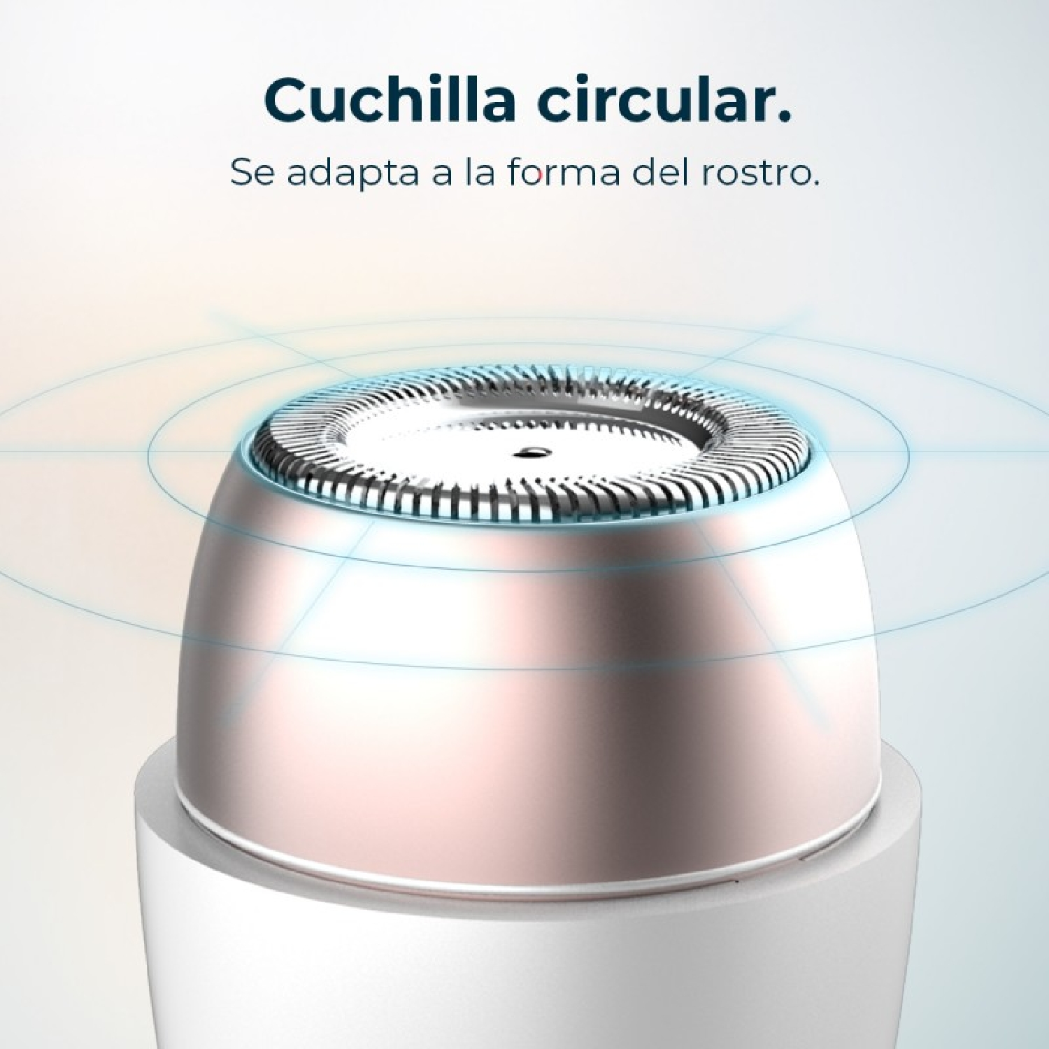 Primer plano del cabezal de una afeitadora con acabado metálico y rosado.