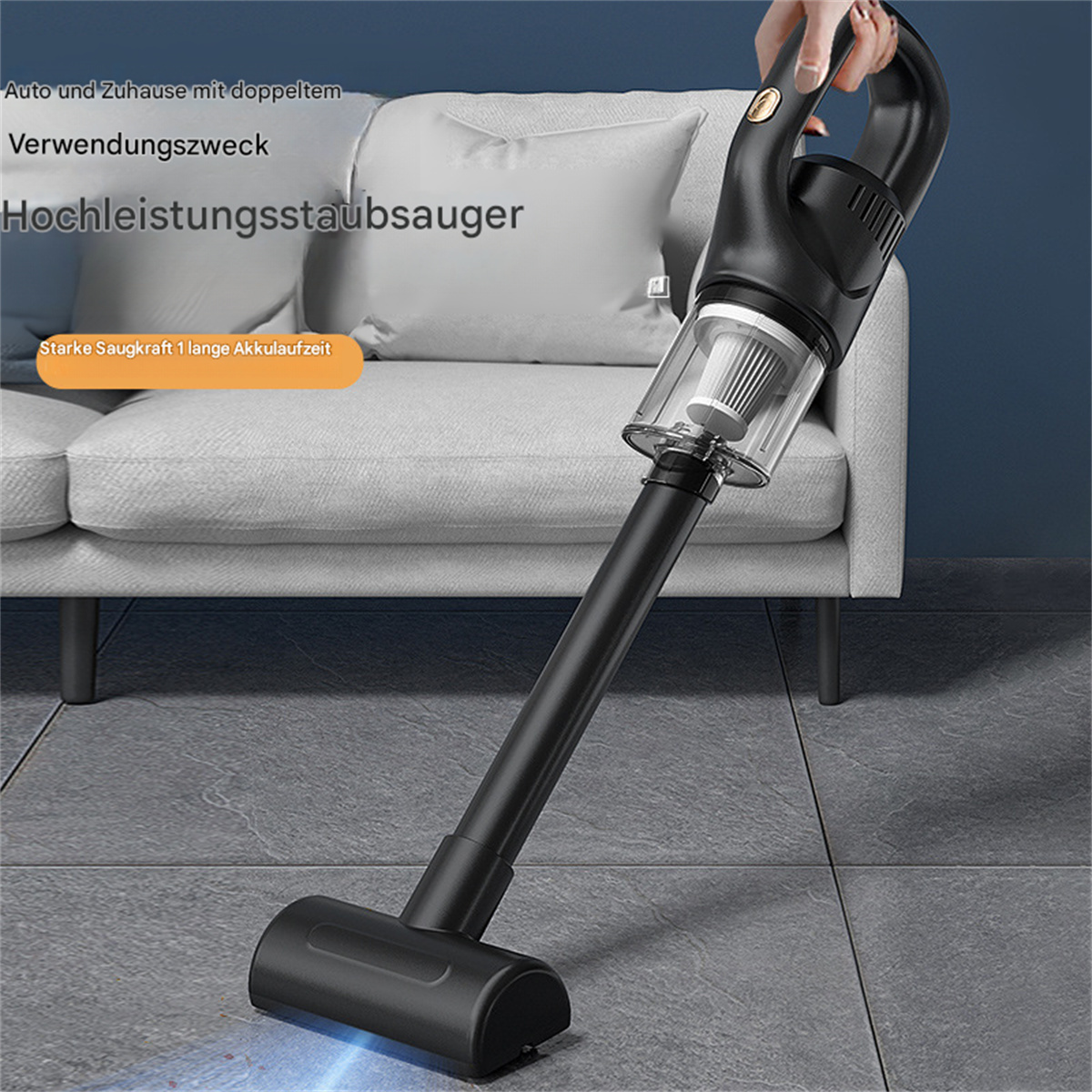 Ein schwarzer Staubsauger mit langem Griff wird gezeigt. Der Griff wird von einer Person gehalten.