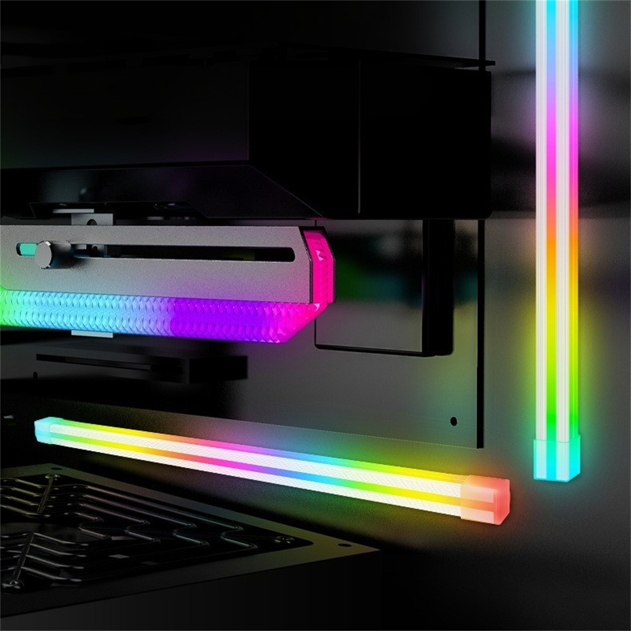 Computergehäuse-Innenraum mit bunten LED-Lichtleisten in verschiedenen Positionen.