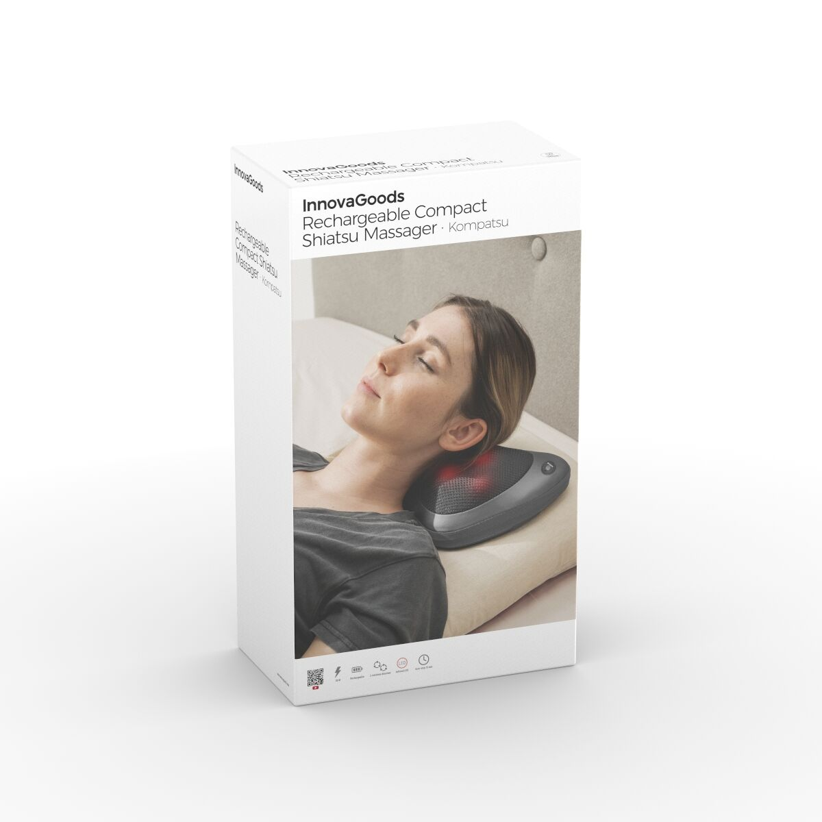 Scatola con una donna che usa un massaggiatore shiatsu. La scatola mostra il prodotto e le sue caratteristiche.