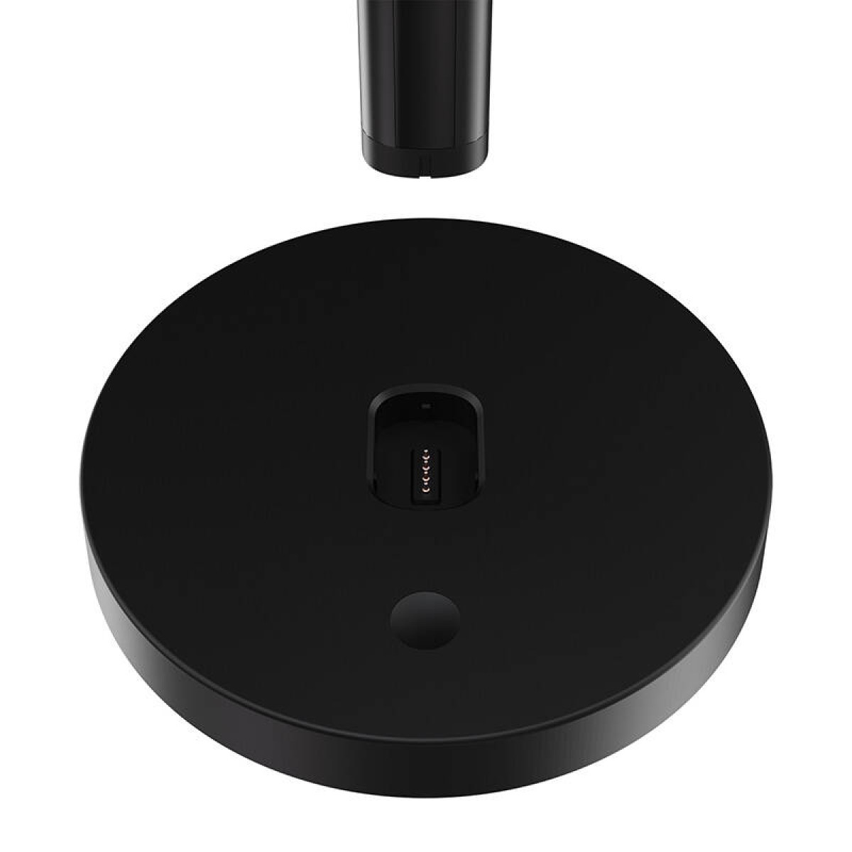 Czarna stacja ładująca z cylindryczną górą.