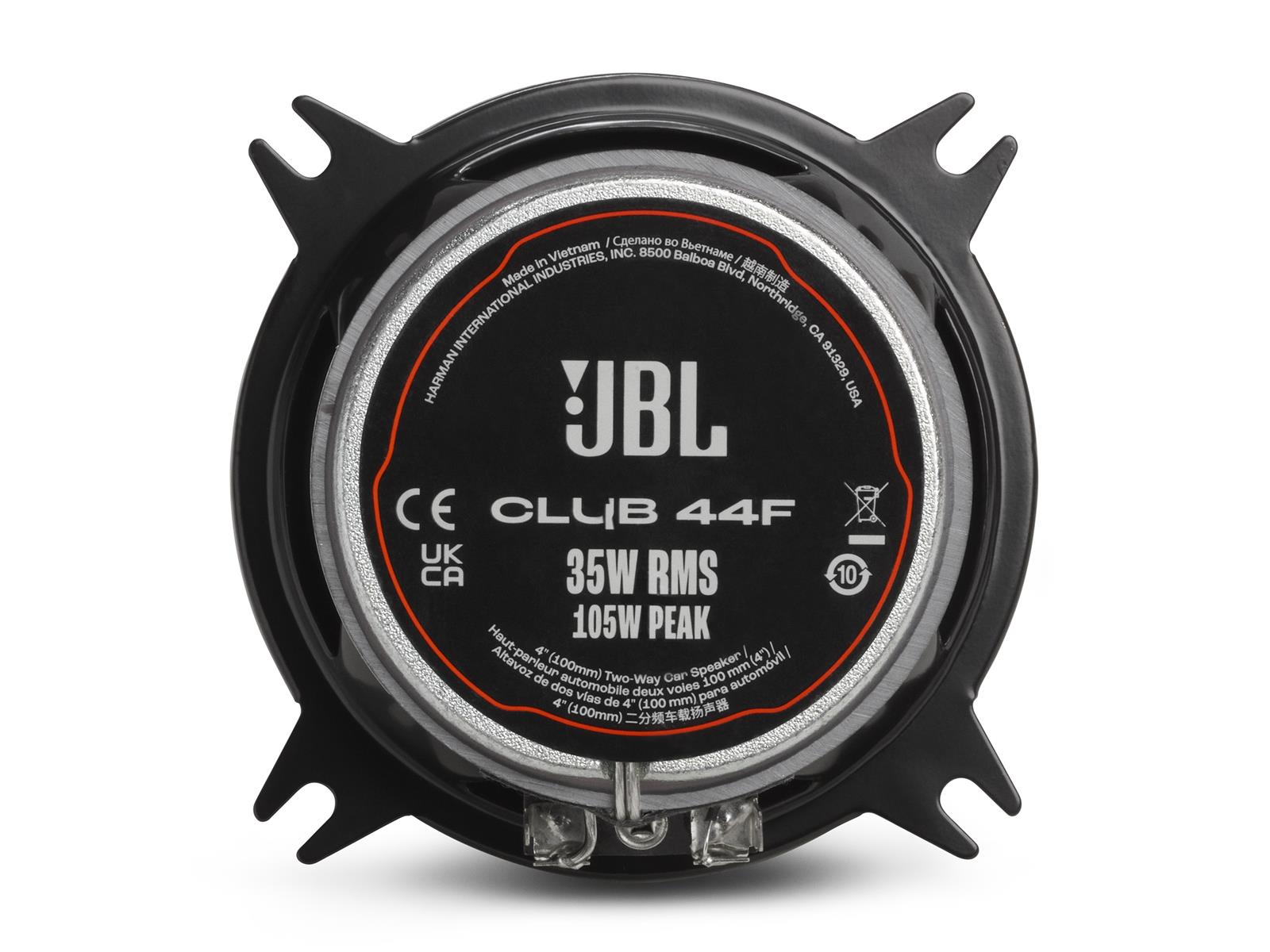 Un haut-parleur de voiture JBL noir. Il a une forme circulaire noire avec le logo de l'entreprise.