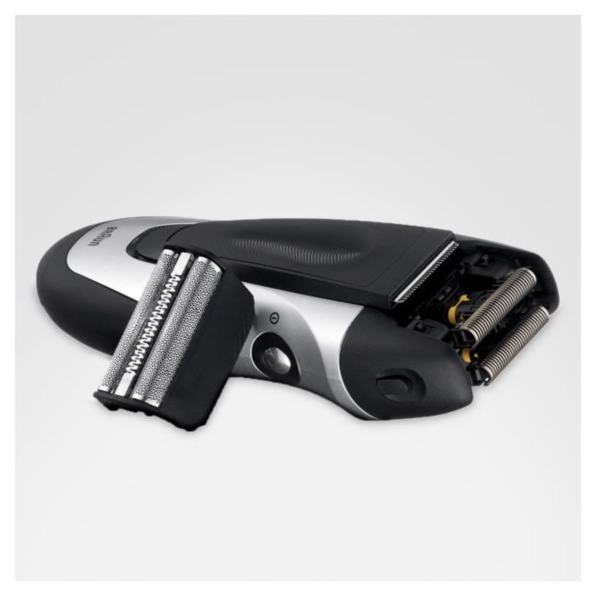 Golarka elektryczna zdemontowana, pokazująca ostrze i mechanizmy wewnętrzne. Czarno-srebrny design.