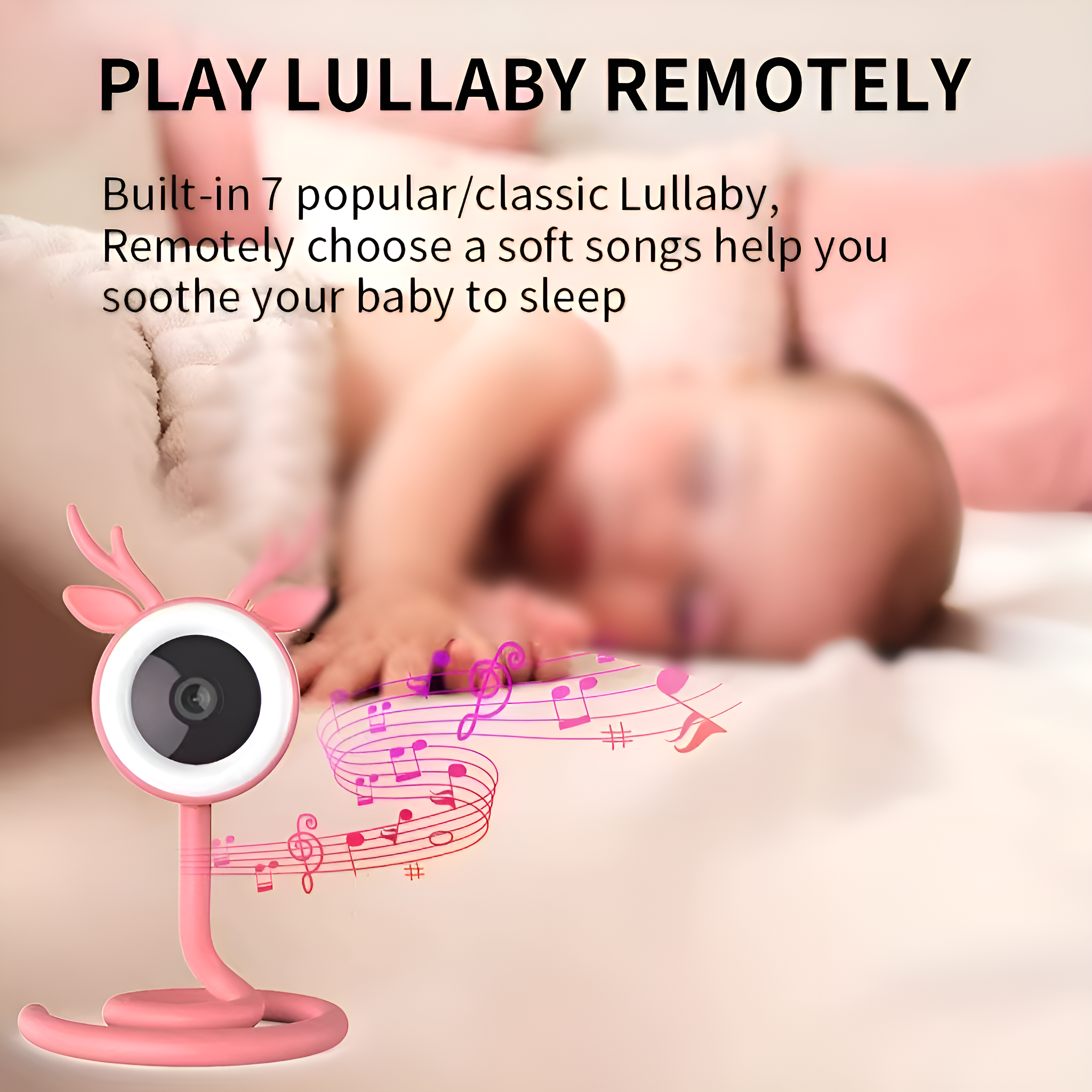 Babyphone mit einer rosa hirschförmigen Kamera, Notizen und einem schlafenden Baby im Hintergrund.