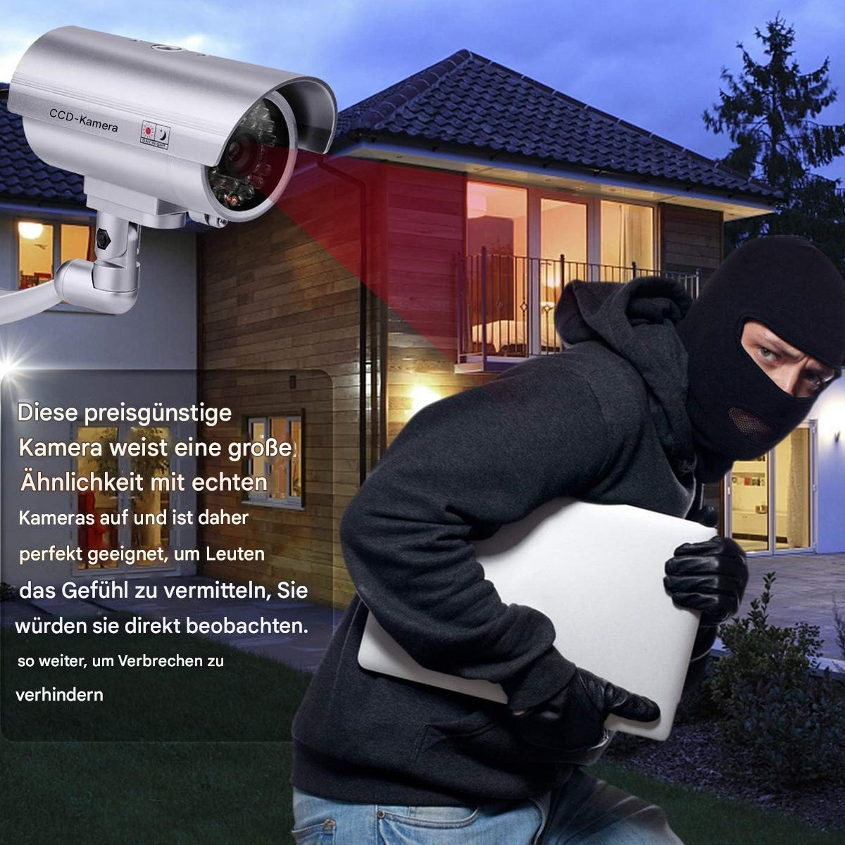 Eine Überwachungskamera und eine Person mit schwarzer Maske hält einen Laptop.