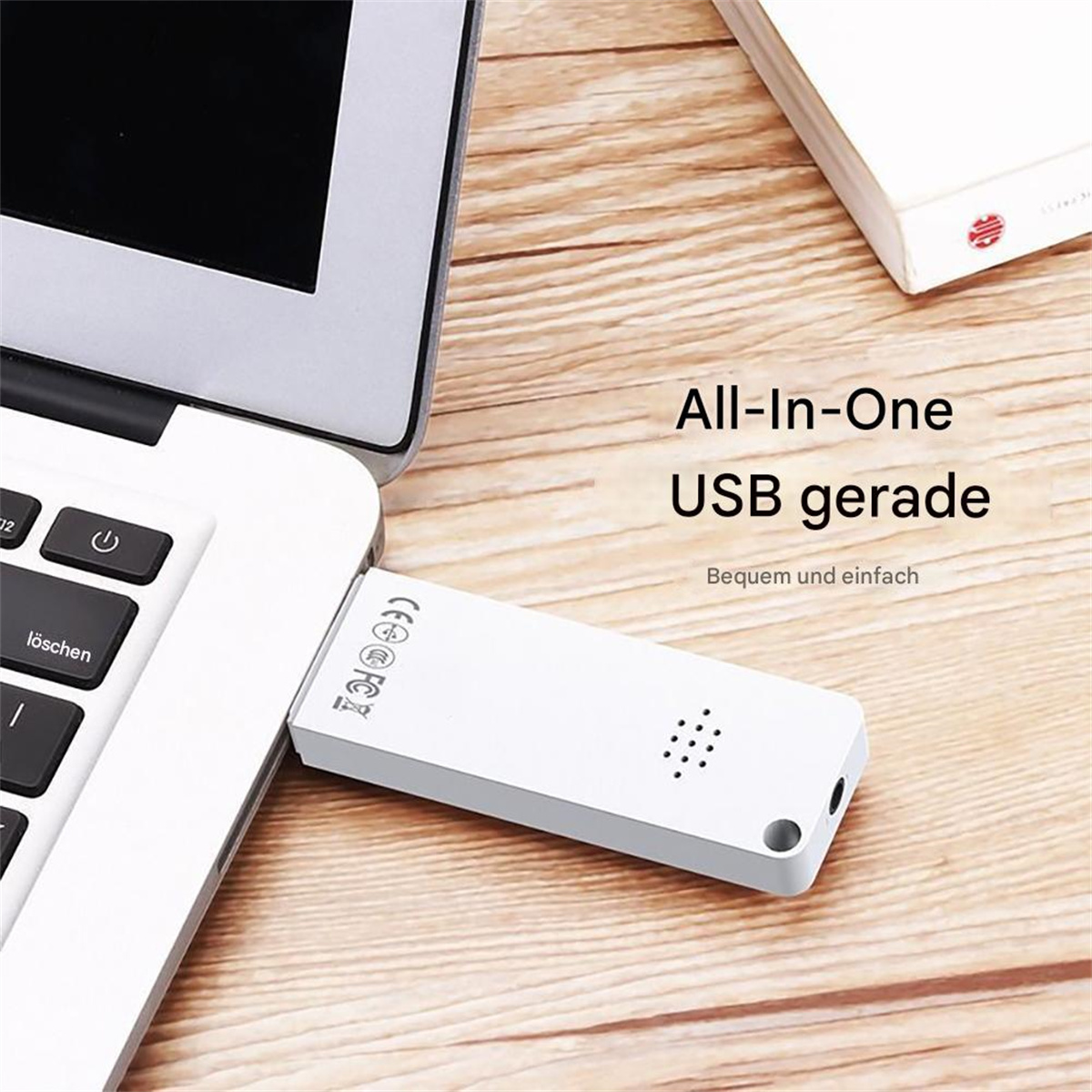 Ein weißer USB-Adapter ist an einen Laptop angeschlossen. Text lautet All-In-One USB.