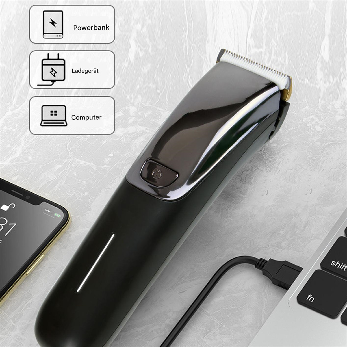 Schwarzer Trimmer, der zum Aufladen an einen Laptop angeschlossen ist, mit Powerbank- und Ladesymbolen.