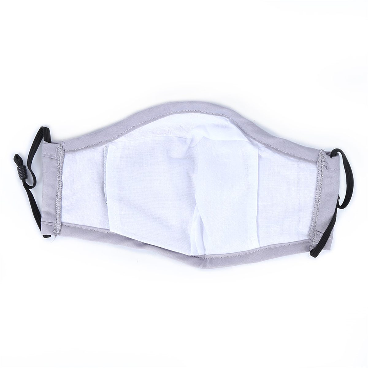 Graue Gesichtsmaske. Weißes Innere und graue Außenkanten. Schwarze, verstellbare Ohrriemen.