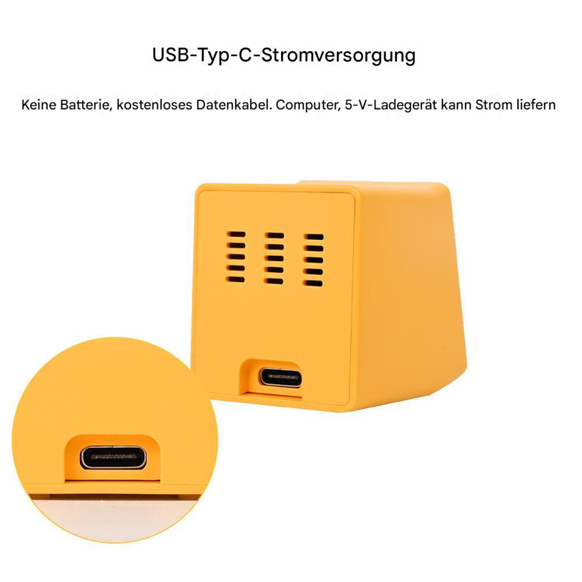 Gelbes quaderförmiges Gerät mit USB-C-Anschluss, schwarzen Lüftungsschlitzen. Text: 'USB-Typ-C-Stromversorgung'.
