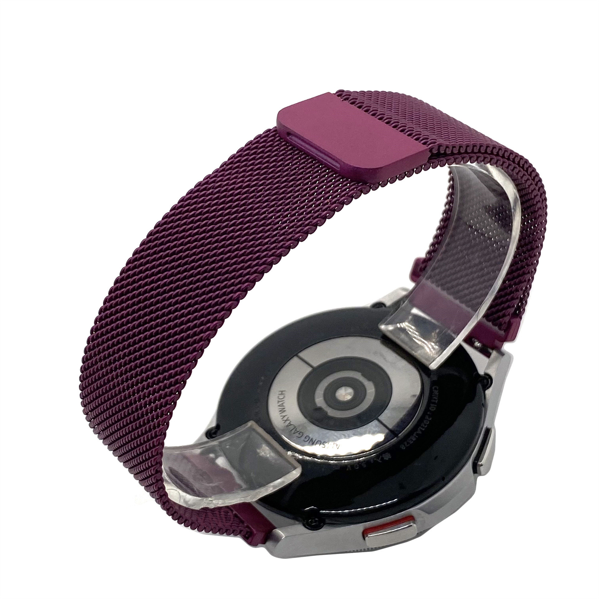 Eine Smartwatch mit lila Mesh-Armband wird gezeigt, die Rückseite und Details des Verschlusses zeigt.