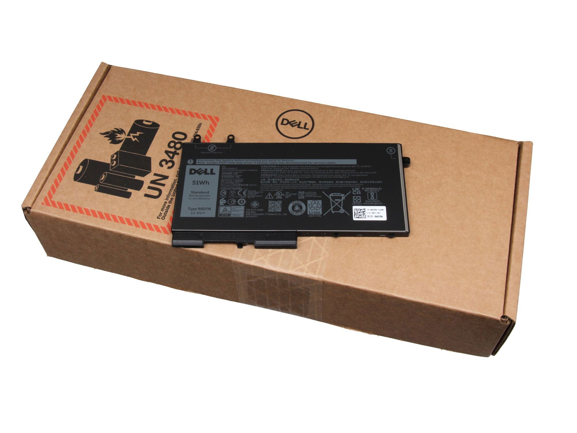 Laptop-Akku in einem Karton. Die Box hat Warnungen und das Dell-Logo.