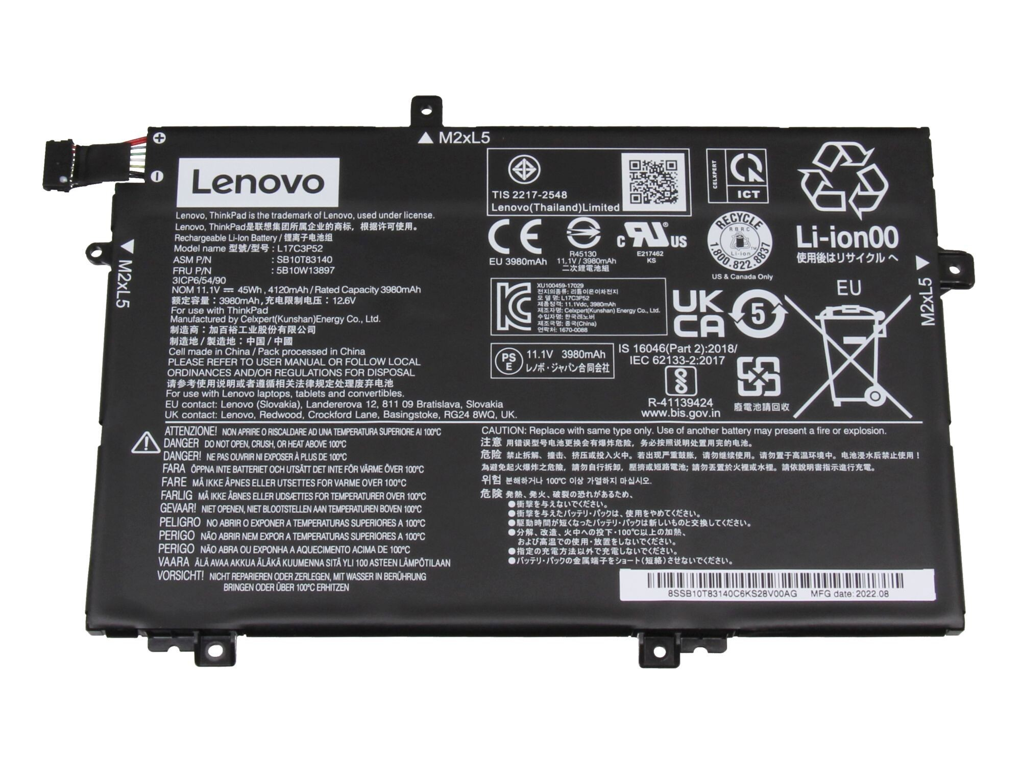 Laptop-Akku mit Text in mehreren Sprachen und einer Warnung.