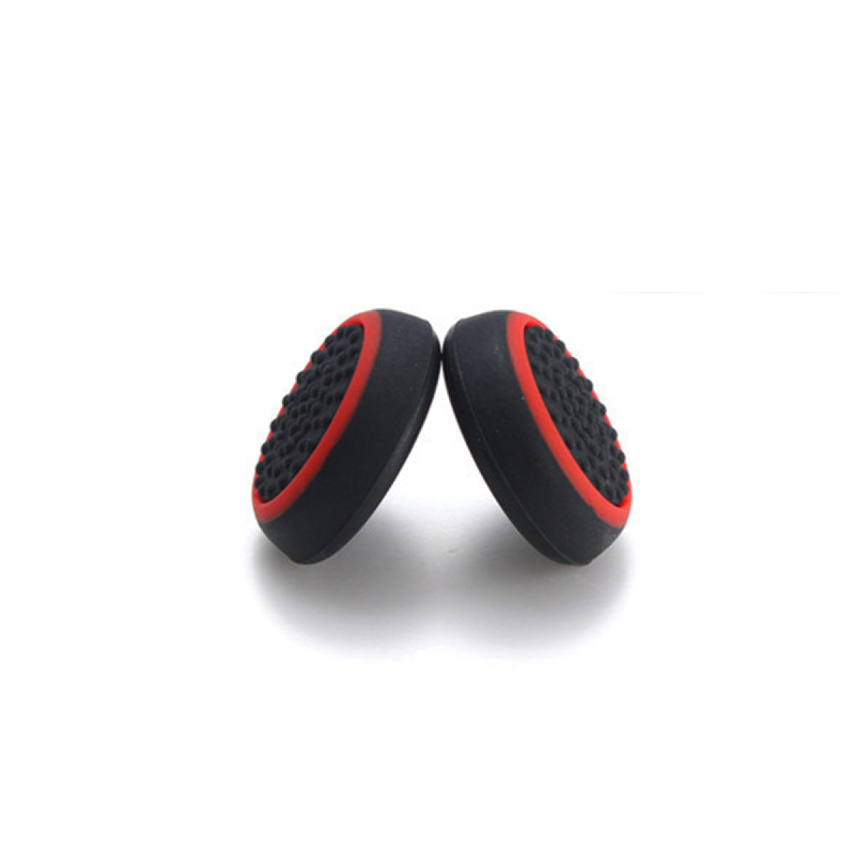 Two black and red joystick grips, viewed close-up, on a white background.