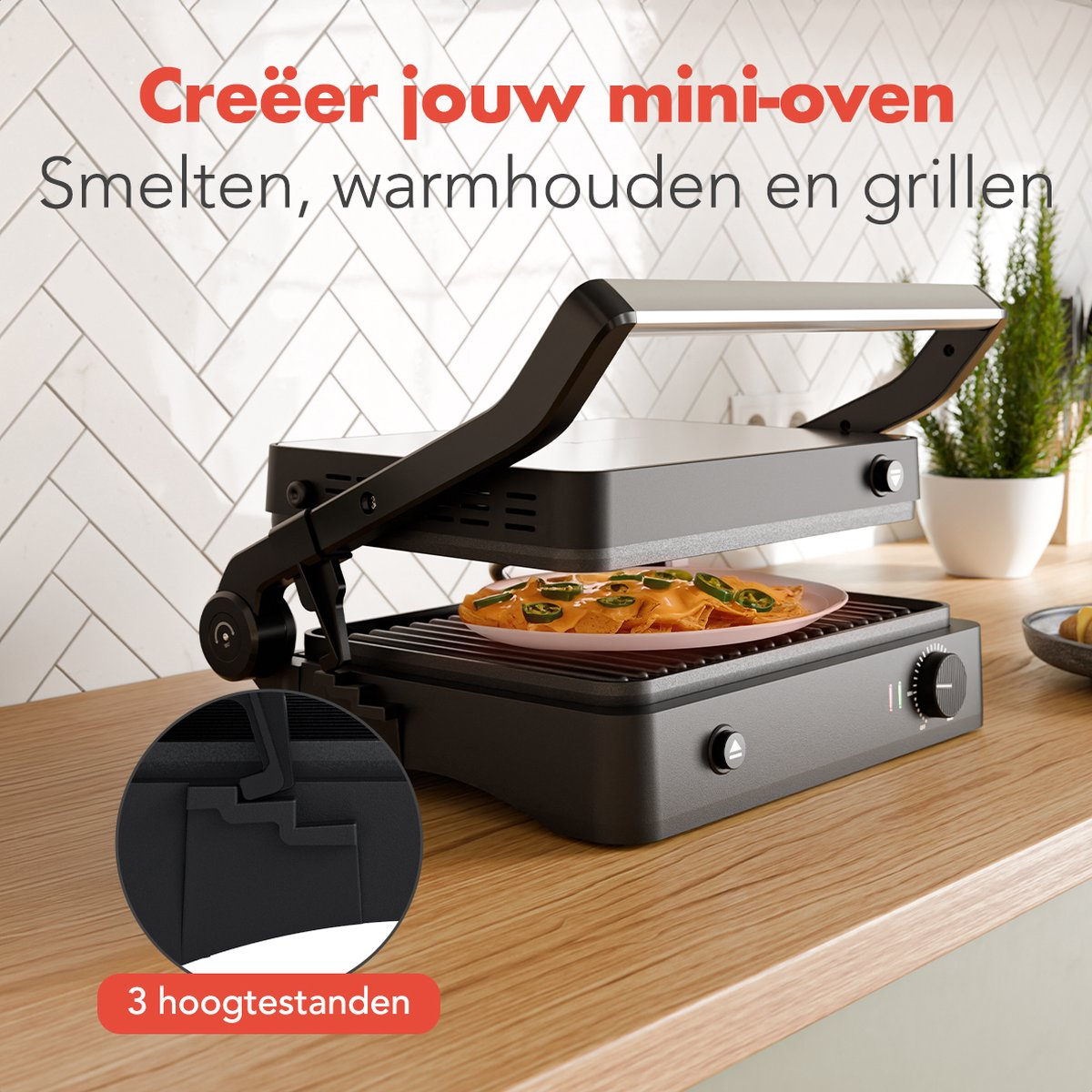 Kitchen Brothers contact grill. There is food inside. The grill is black.