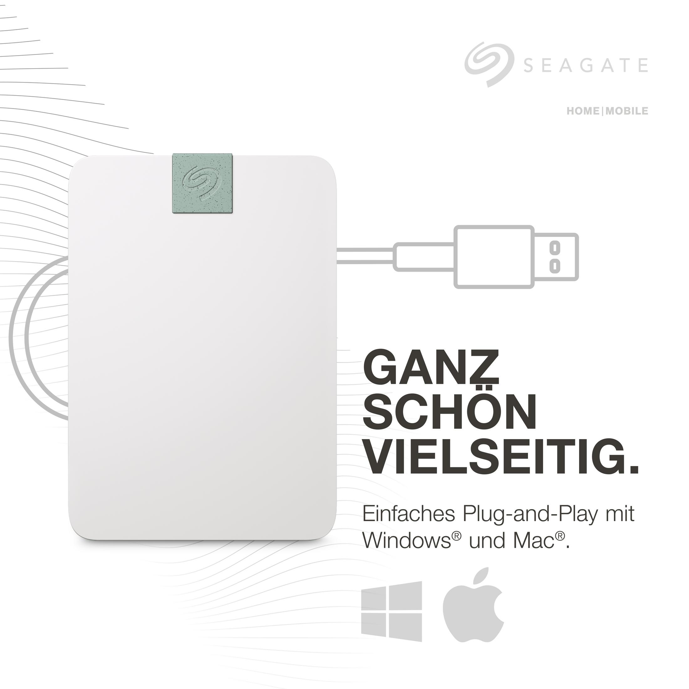 Biały przenośny dysk twardy z zielonym akcentem i kablem USB. Tekst: Ganz Schön Vielseitig.