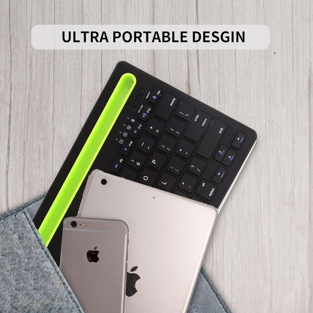 Un teclado negro y un teléfono están dentro de una funda gris.