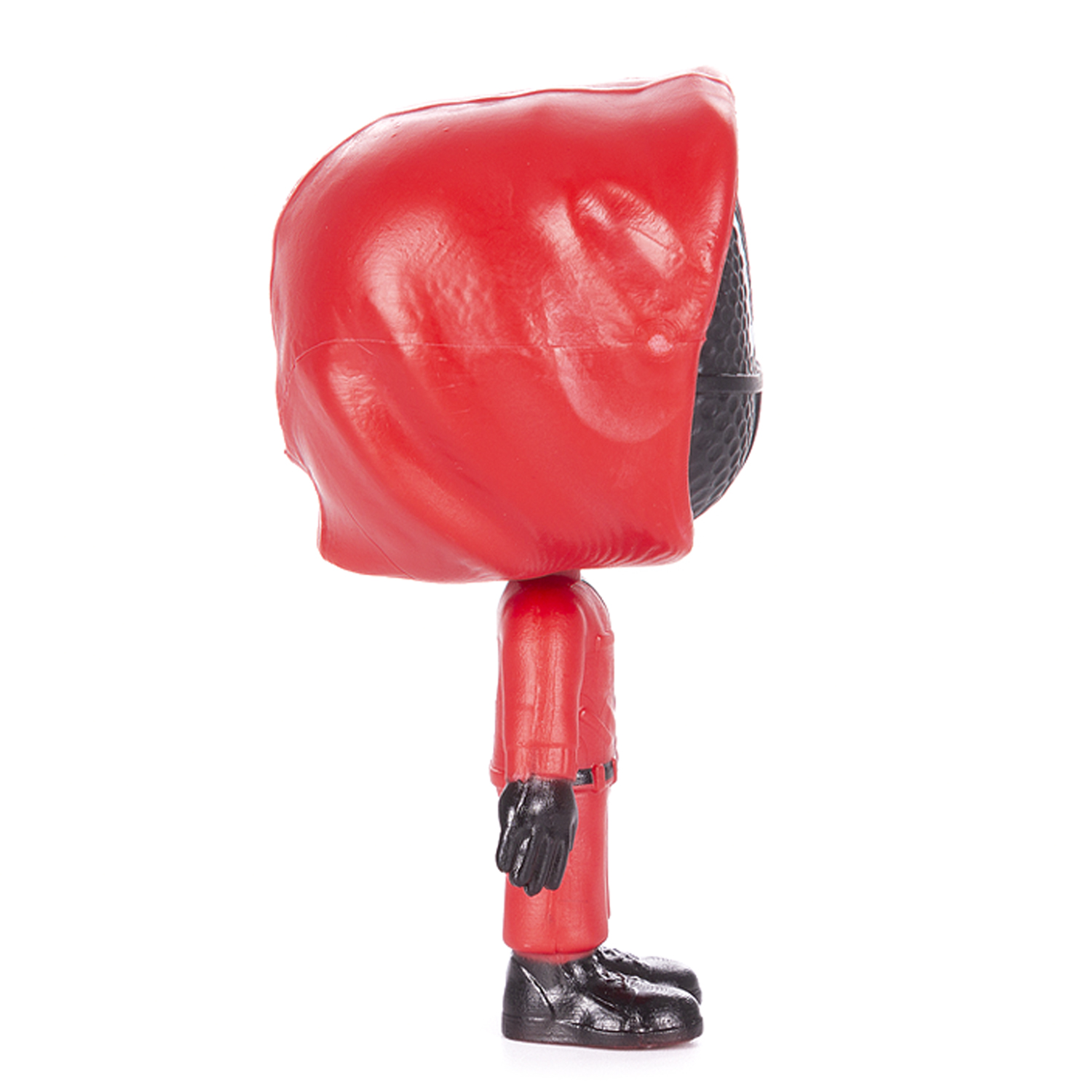 Personaggio giocattolo in abito rosso di lato. Copricapo rosso con maschera nera.