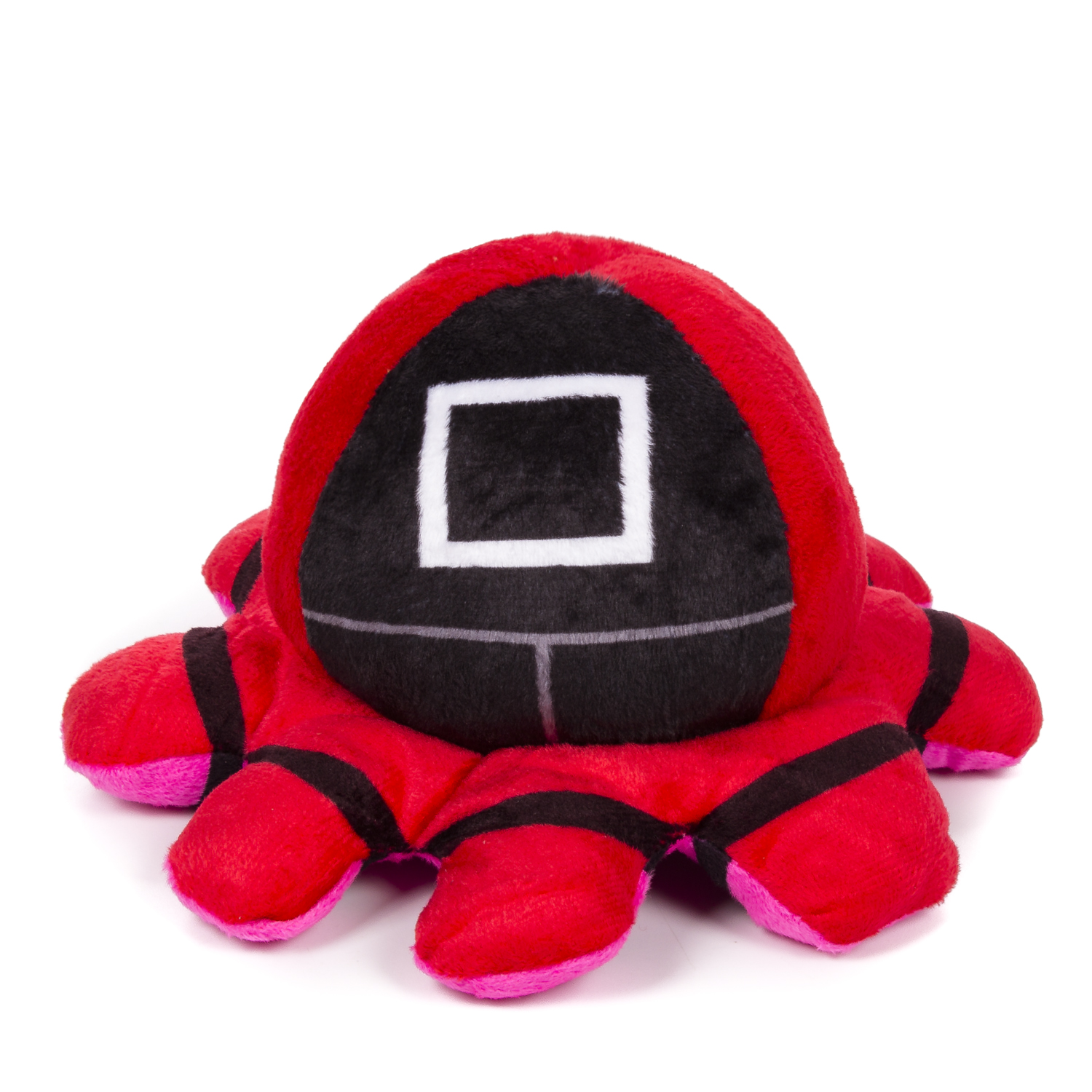 Un peluche a forma di figura mascherata rossa e nera con un quadrato bianco sul viso.