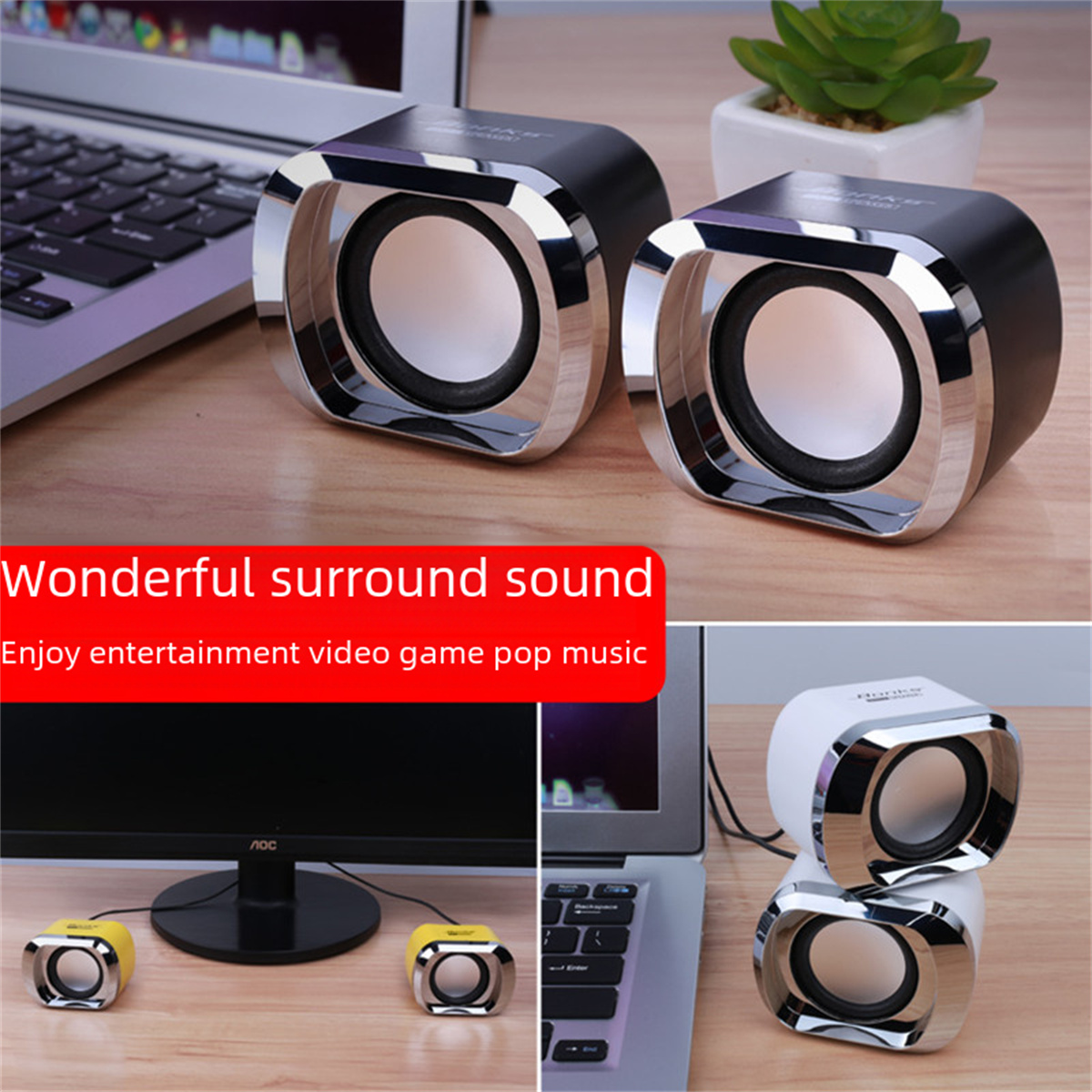 Schwarze und silberne Lautsprecher auf einem Holztisch, Monitor und eine Pflanze. Text: 'Wunderbarer Surround-Sound'.