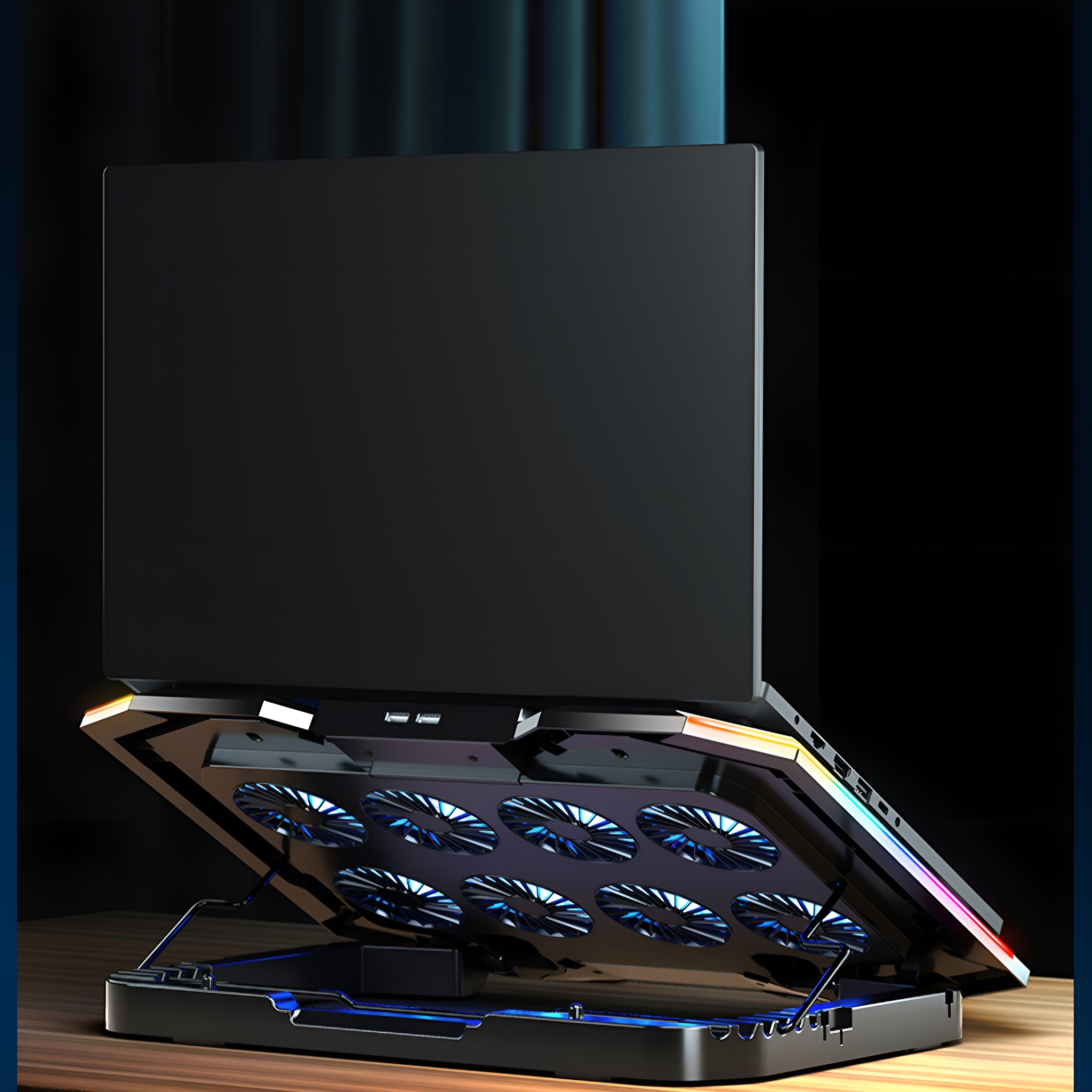Laptop auf einem Kühlpad mit Lüftern und LED-Lichtern.