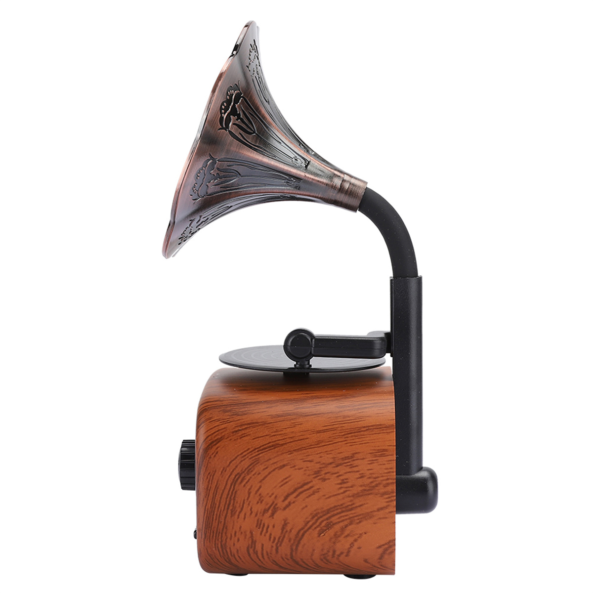 Ein Vintage-Grammophon in einem Holzkoffer mit einem Kupferhorn.