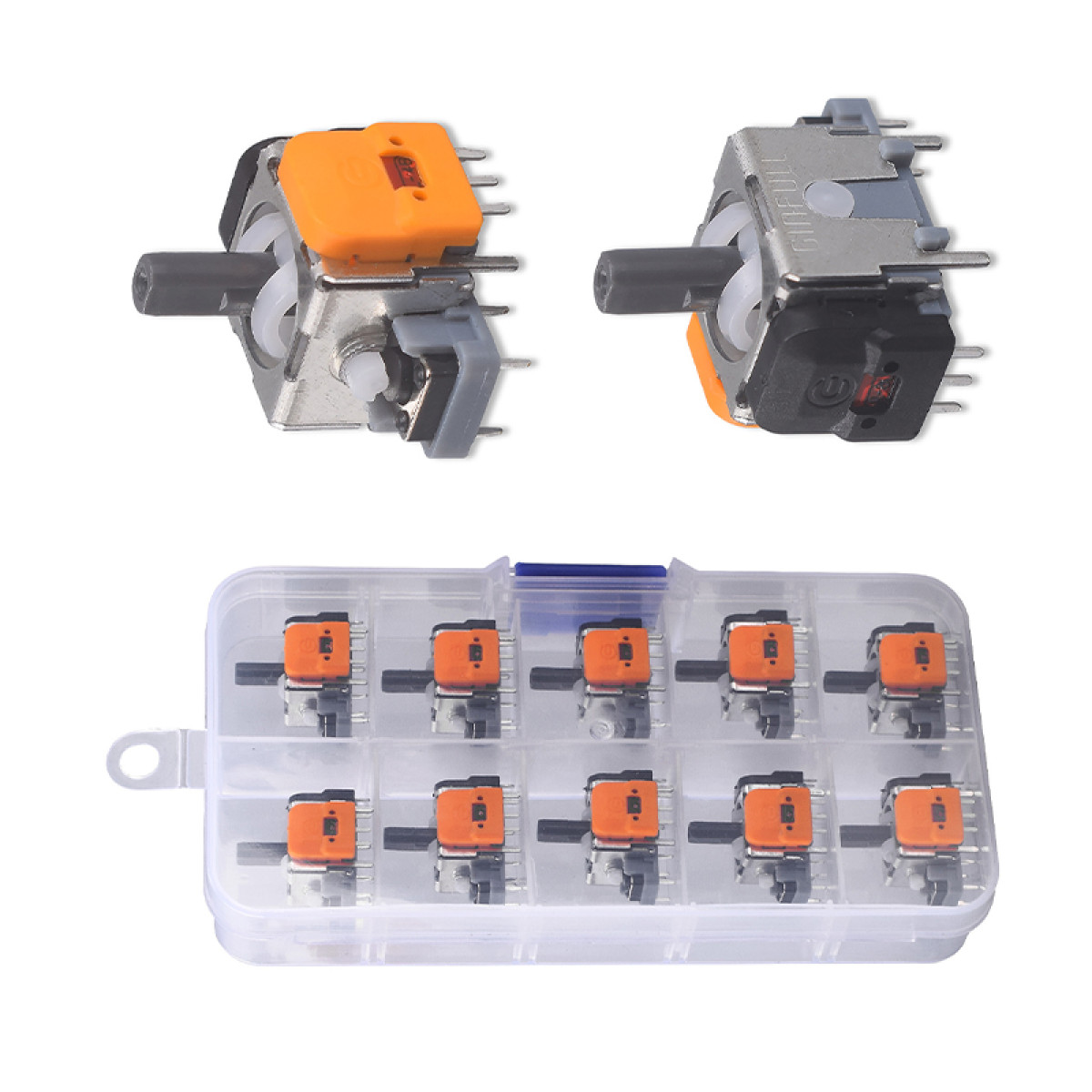 Dwa pomarańczowo-czarne moduły joysticka i pudełko podobnych modułów na białym.