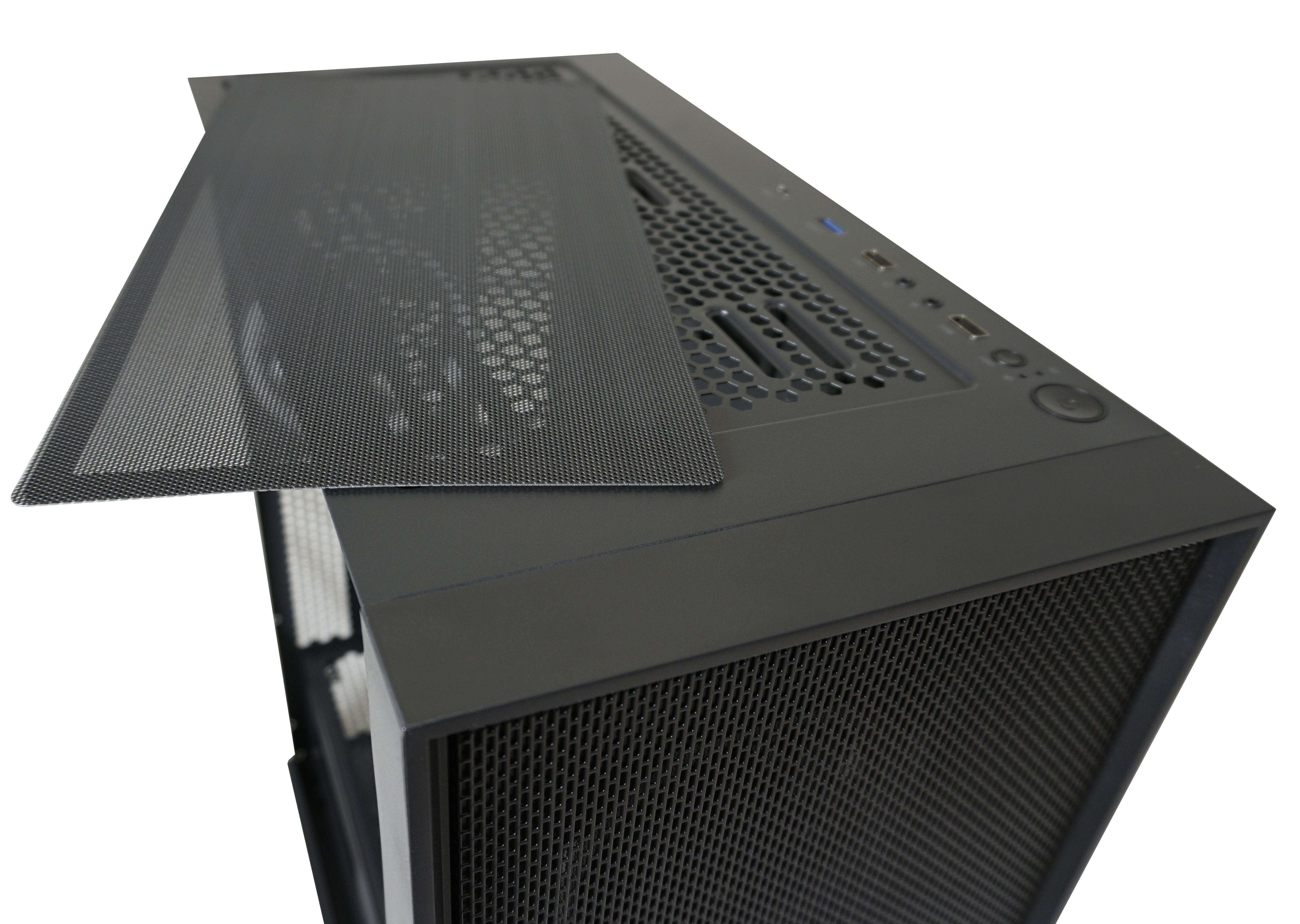 Widok z góry obudowy komputera z siatką i portami, czarny kolor, białe tło.
