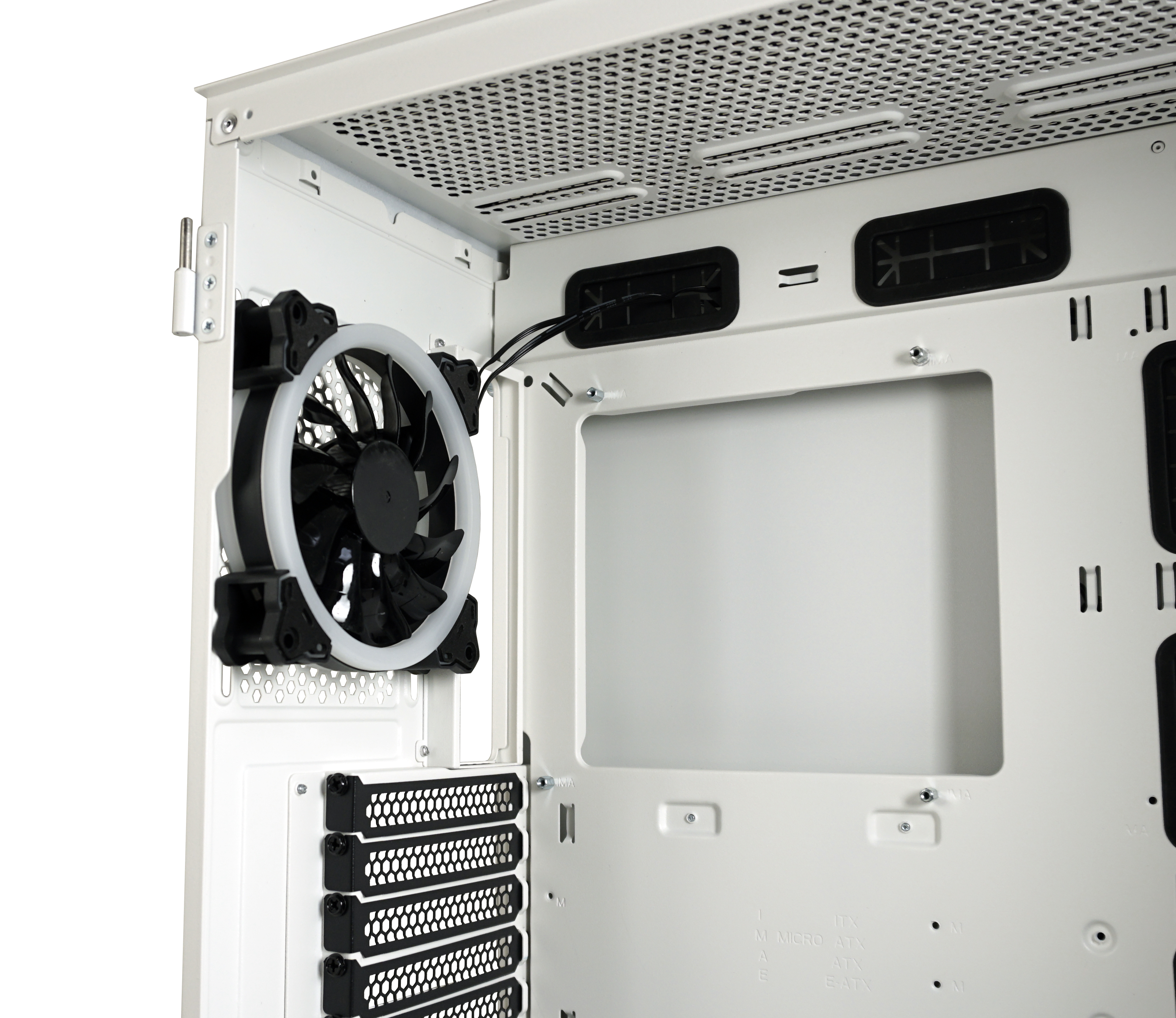 White computer case interior. A fan with a white ring light and a ventilation opening.
