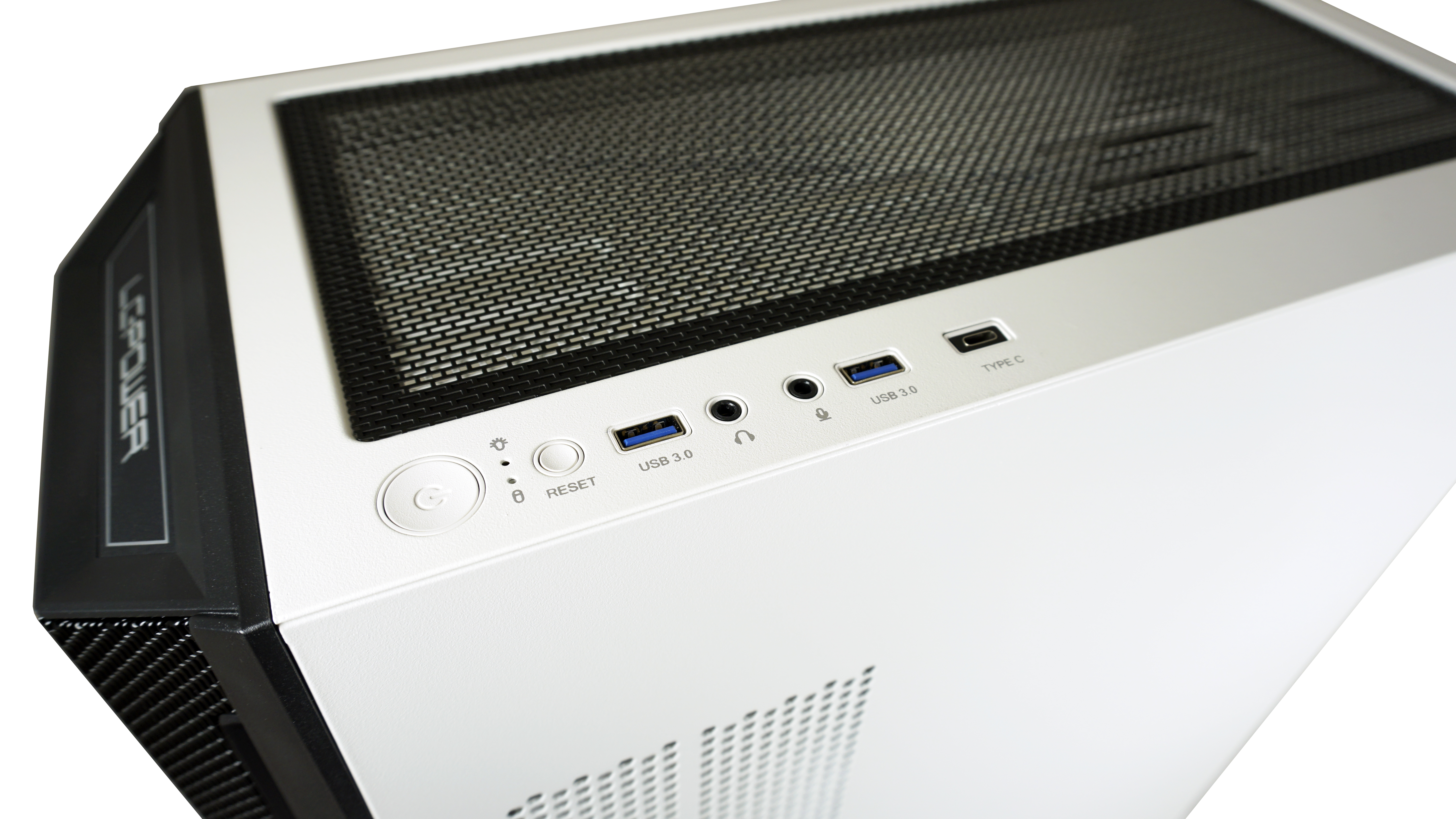 White PC case top view. Power button, ports, and mesh panel visible.