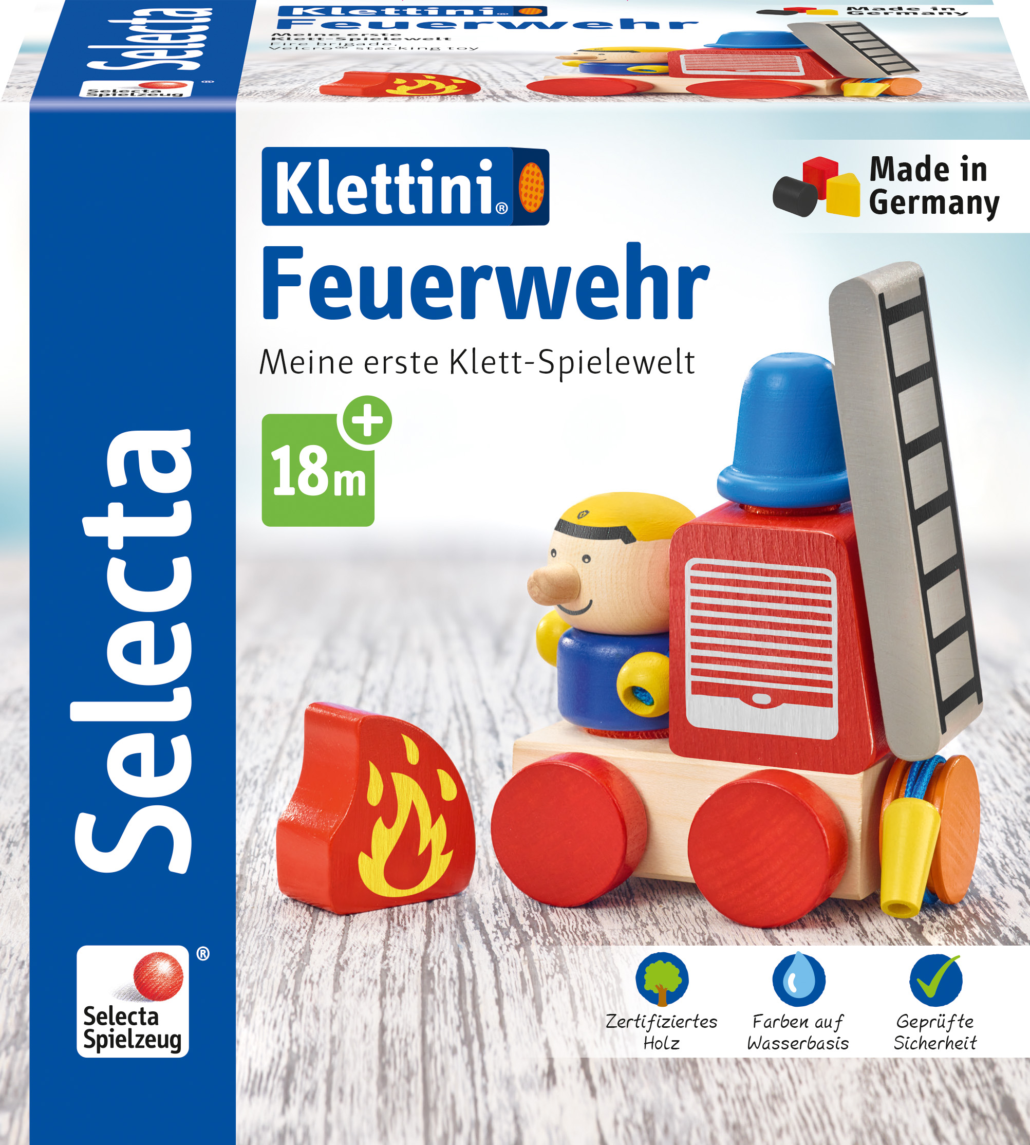 Spielzeug-Feuerwehrwagen mit Feuerwehrmann-Figur und Holzblöcken.