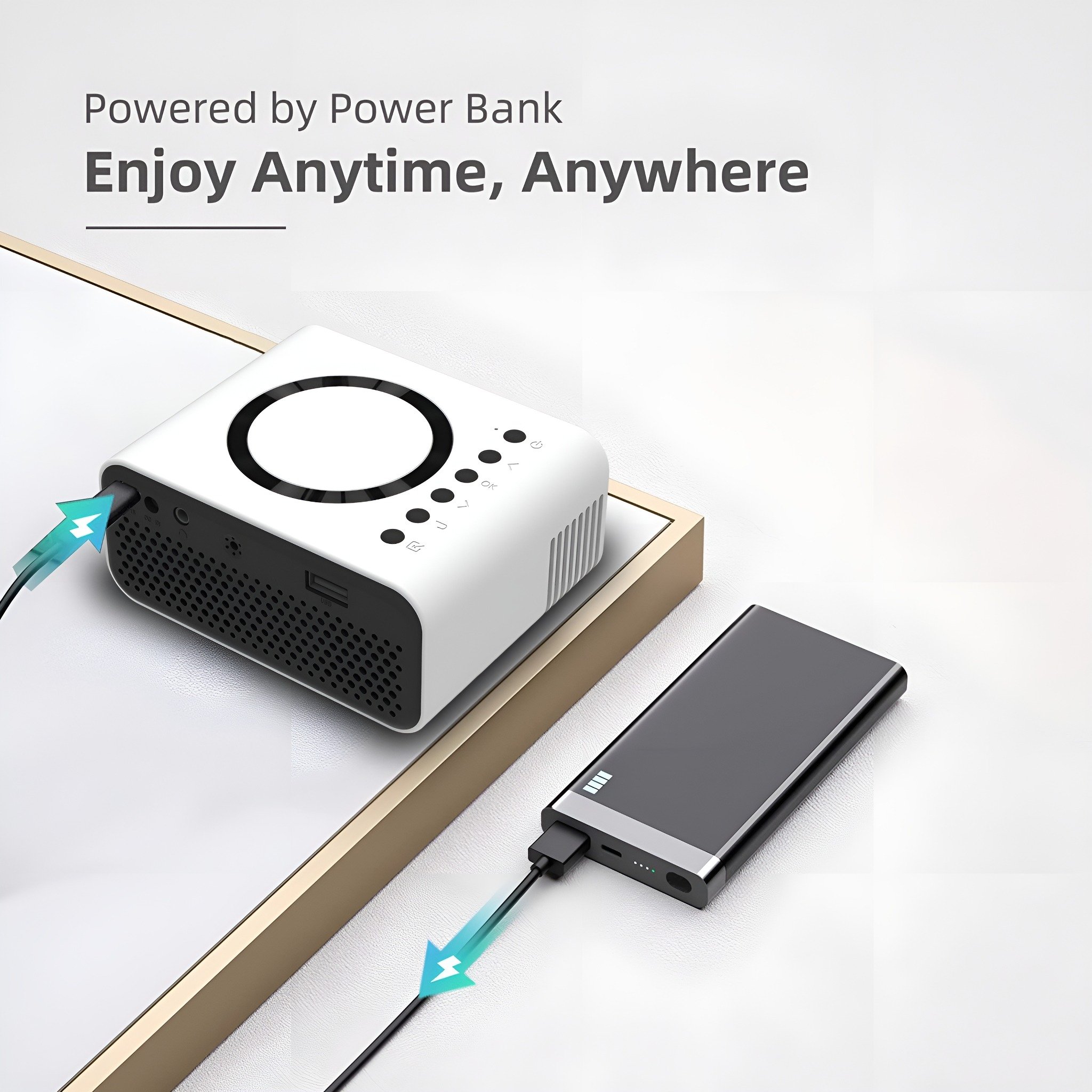 Weißer, tragbarer Projektor mit Powerbank. Der Text lautet: 'Enjoy Anytime, Anywhere', powered by a power bank.