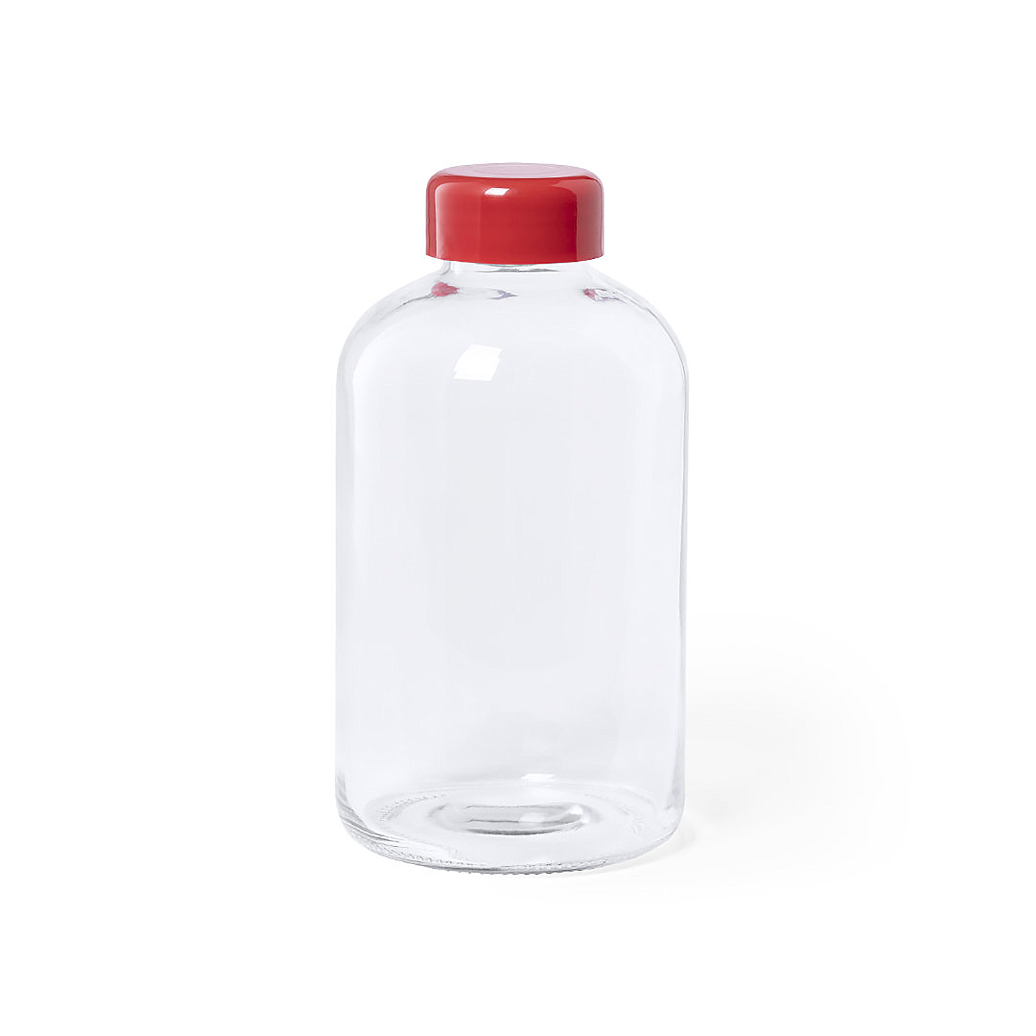 Botella de vidrio transparente con tapón rojo. Sobre fondo blanco.