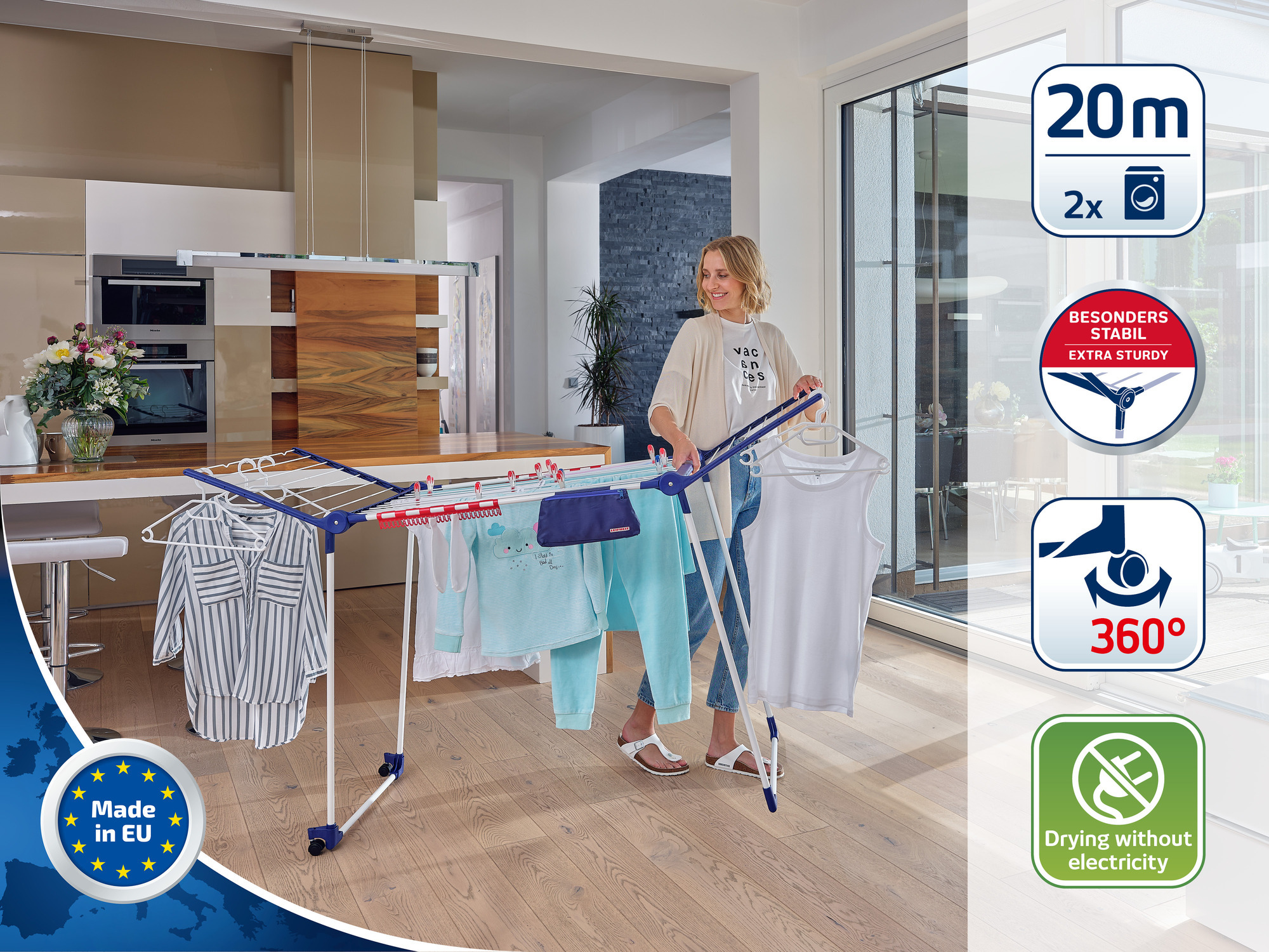 Kobieta wiesza ubrania na suszarce. Ubrania są niebieskie i białe. Tekst: 20m, bardzo wytrzymały, 360°.