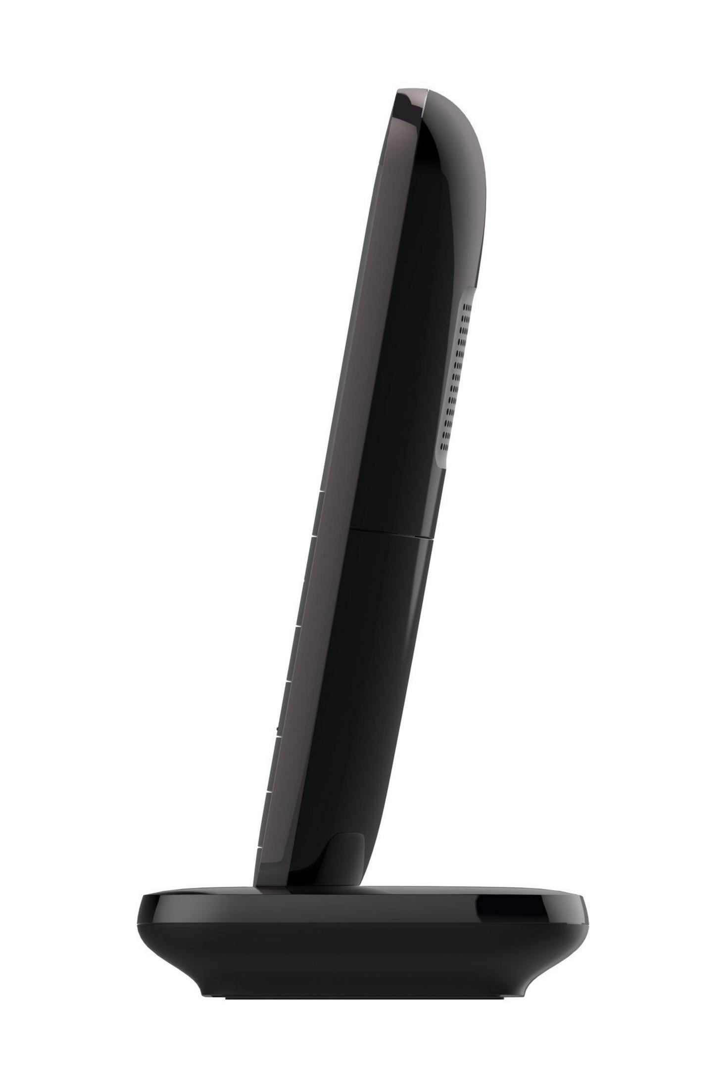 Un téléphone sans fil noir sur son socle de chargement, vue de côté sur fond blanc.