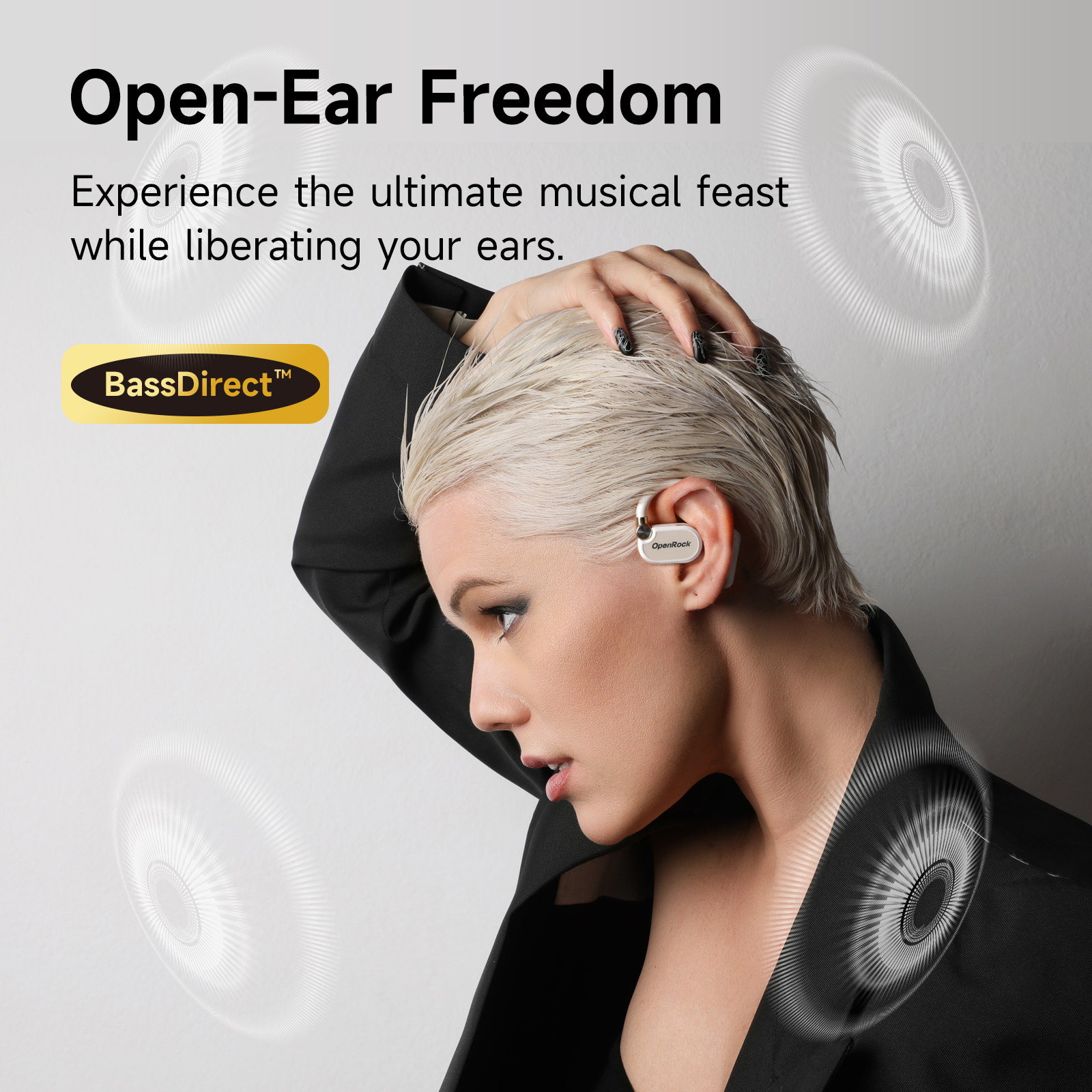Woman wearing white earbuds. Text says 'Open-Ear Freedom'.