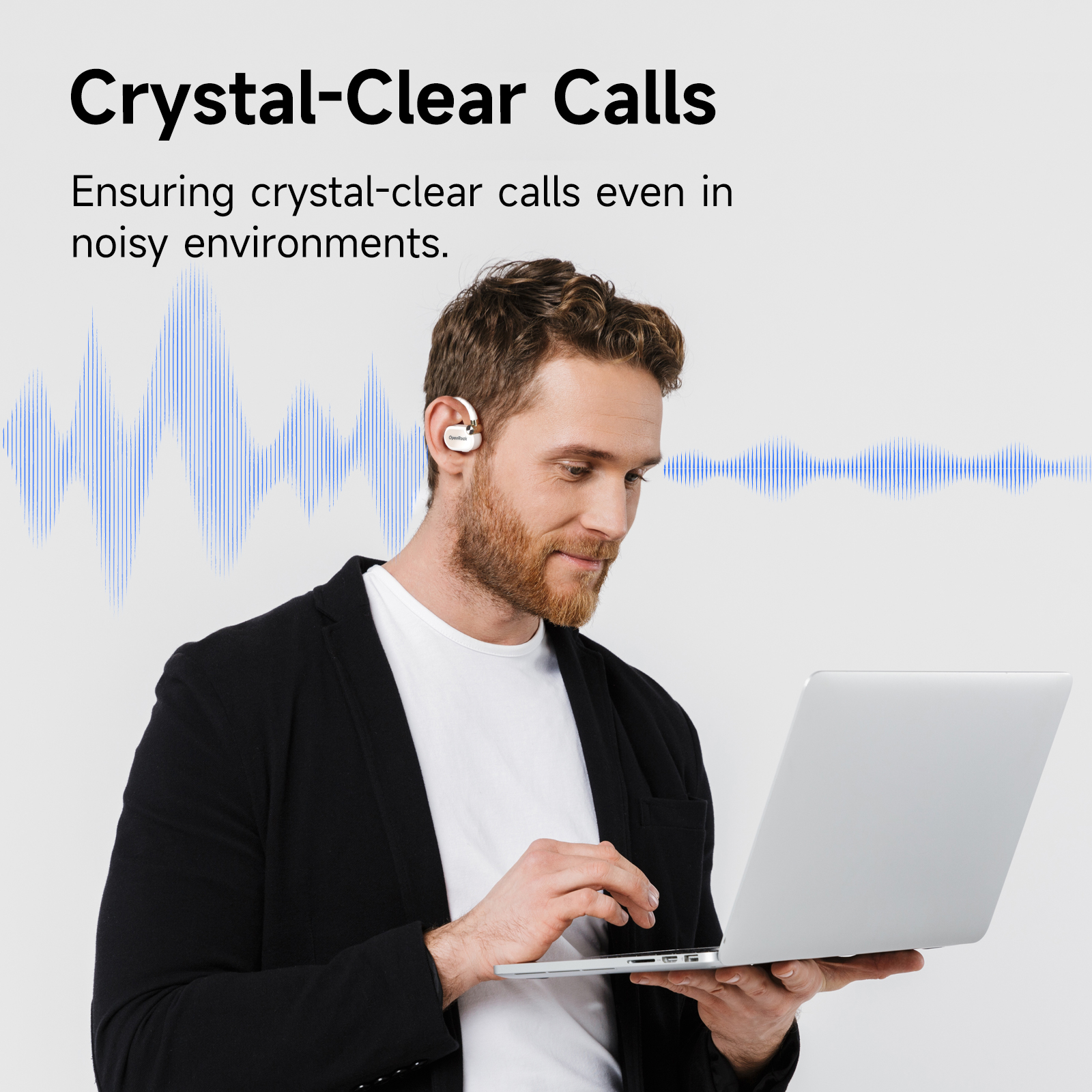 Man using laptop with earphones. Sound waves emanate from the earphones, implying clear calls.