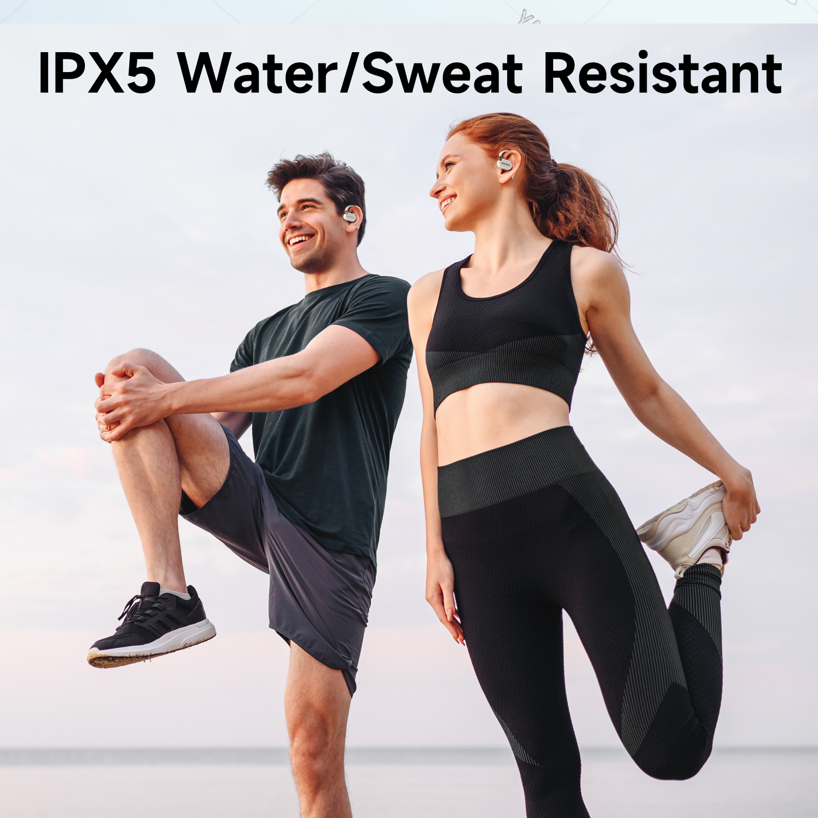 A couple stretching outdoors, wearing earbuds. Text states 'IPX5 Water/Sweat Resistant'.