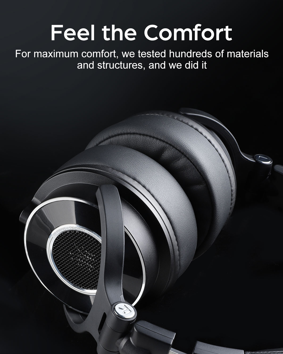 Close-up of black headphones. Text: Feel the Comfort. Shows earcups and headband. Dark background.