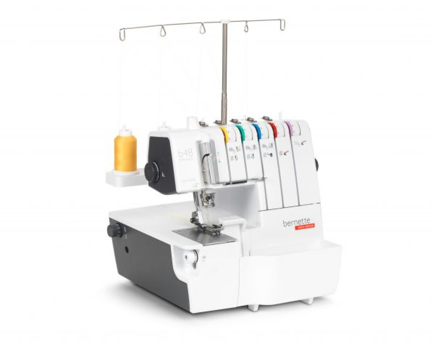 Máquina de coser con cuerpo blanco, varios colores de hilo y una aguja.