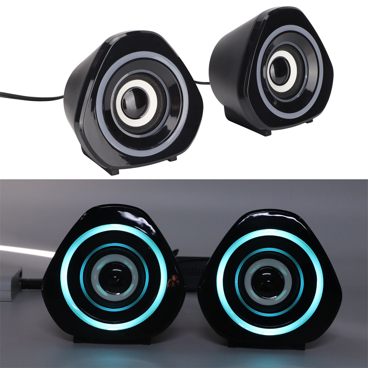 Zwei schwarze Lautsprecher mit blauen LED-Ringen. Die Lautsprecher sind dreieckig. Auf weißem Hintergrund.