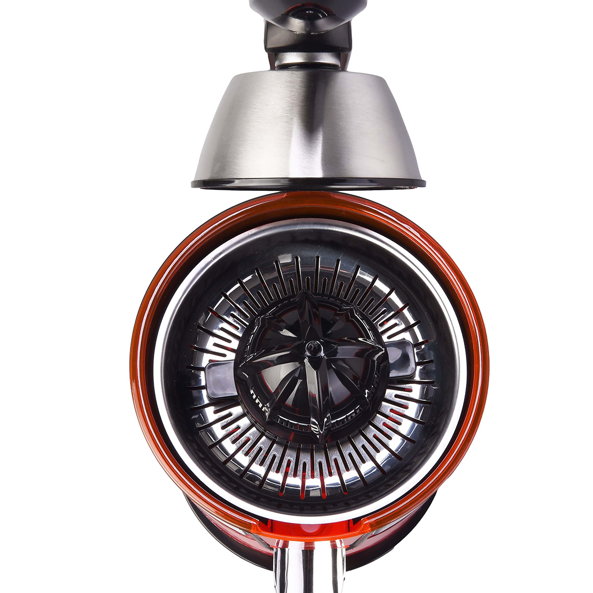 Exprimidor de cítricos, vista superior, con parte de acero inoxidable sobre base roja y plateada.