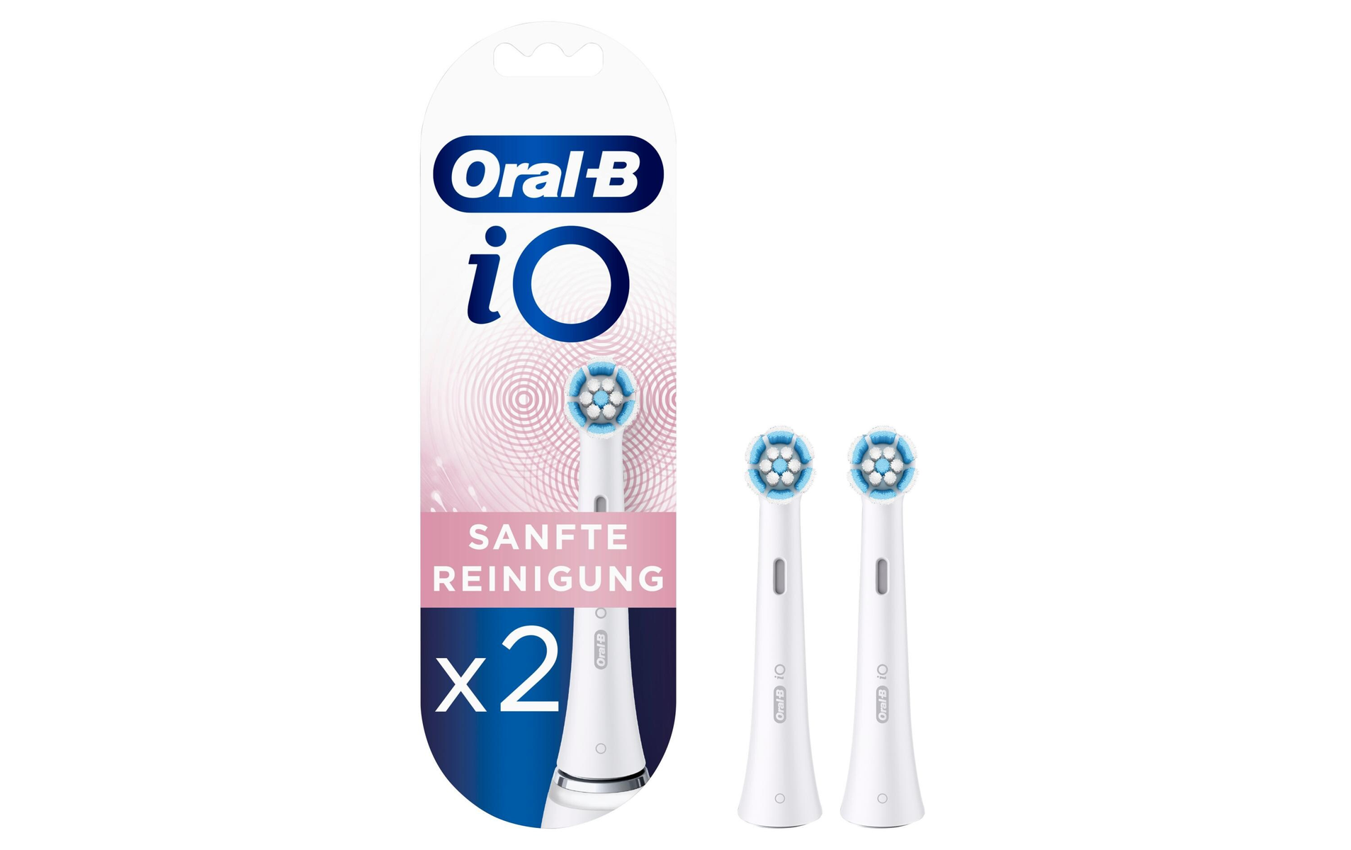 Dwie końcówki do szczoteczki Oral-B iO w opakowaniu, zbliżenie na główki szczoteczki.