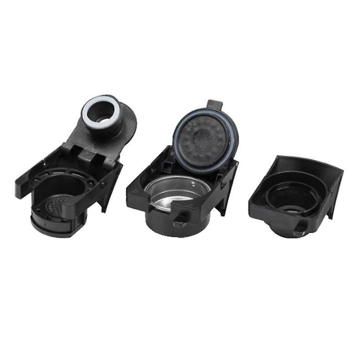 Trzy czarne części ekspresu do kawy, zdemontowane, na białym tle.